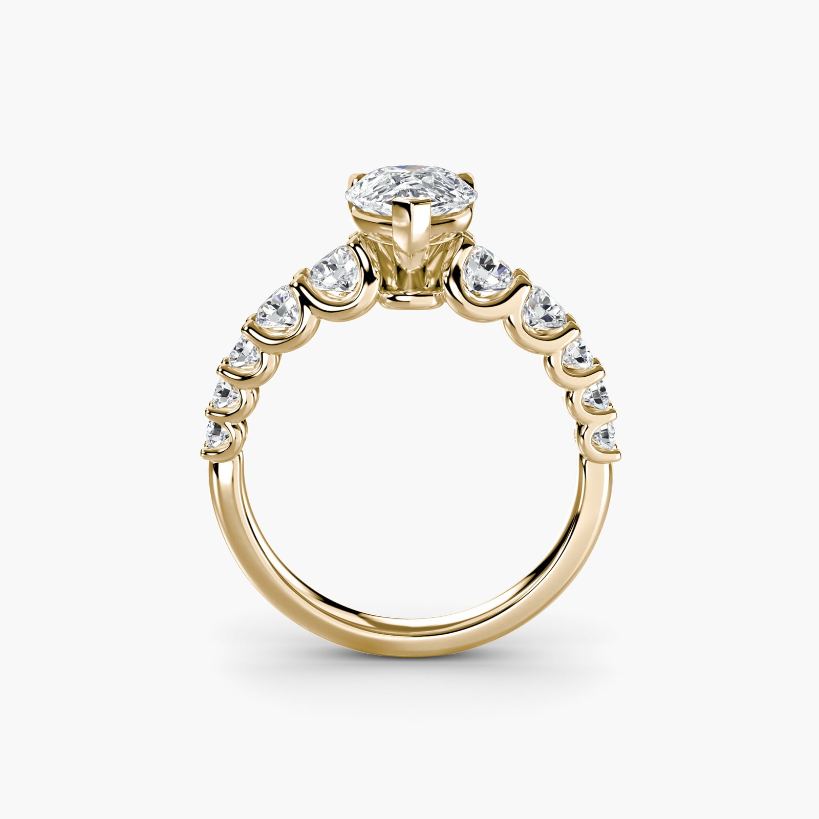 Side Stone Pear 14Kt Yellow Gold Ring Setting: Side Stone Pear 14Kt Yellow Gold Ring Setting Side Stone Pear Ring Setting in 14Kt Yellow Gold boasts a unique pear shape with ten side stones, totaling 1.38 carats in total weight, set against a band