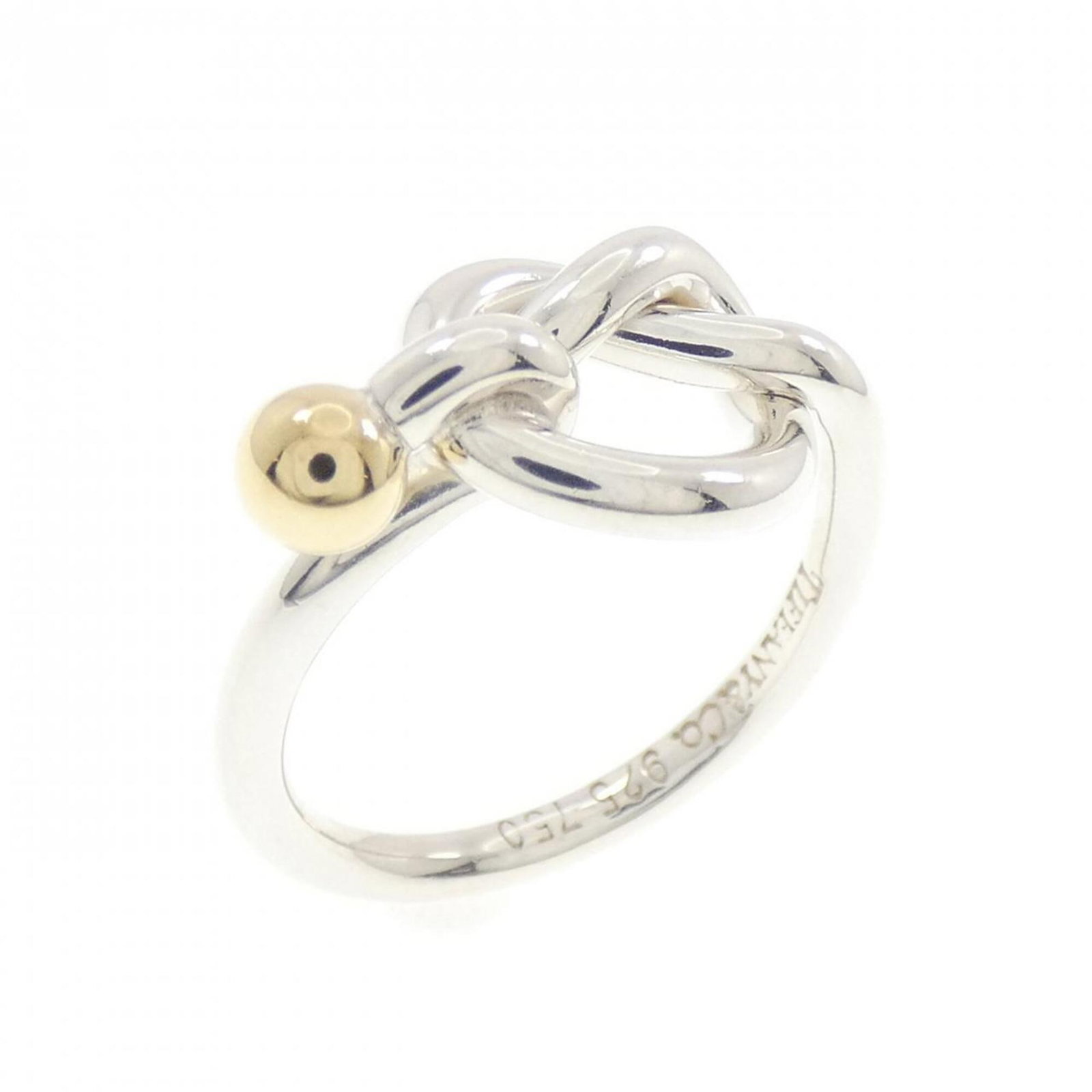 Tiffany Band Ring Silver 925 Yellow Gold (18K): Tiffany Band Ring Silver 925 Yellow Gold (18K) Silver 925 Yellow Gold (18K) band ring from Tiffany, featuring a classic design with a few traces of usage visible. The item shows some scratches and dir