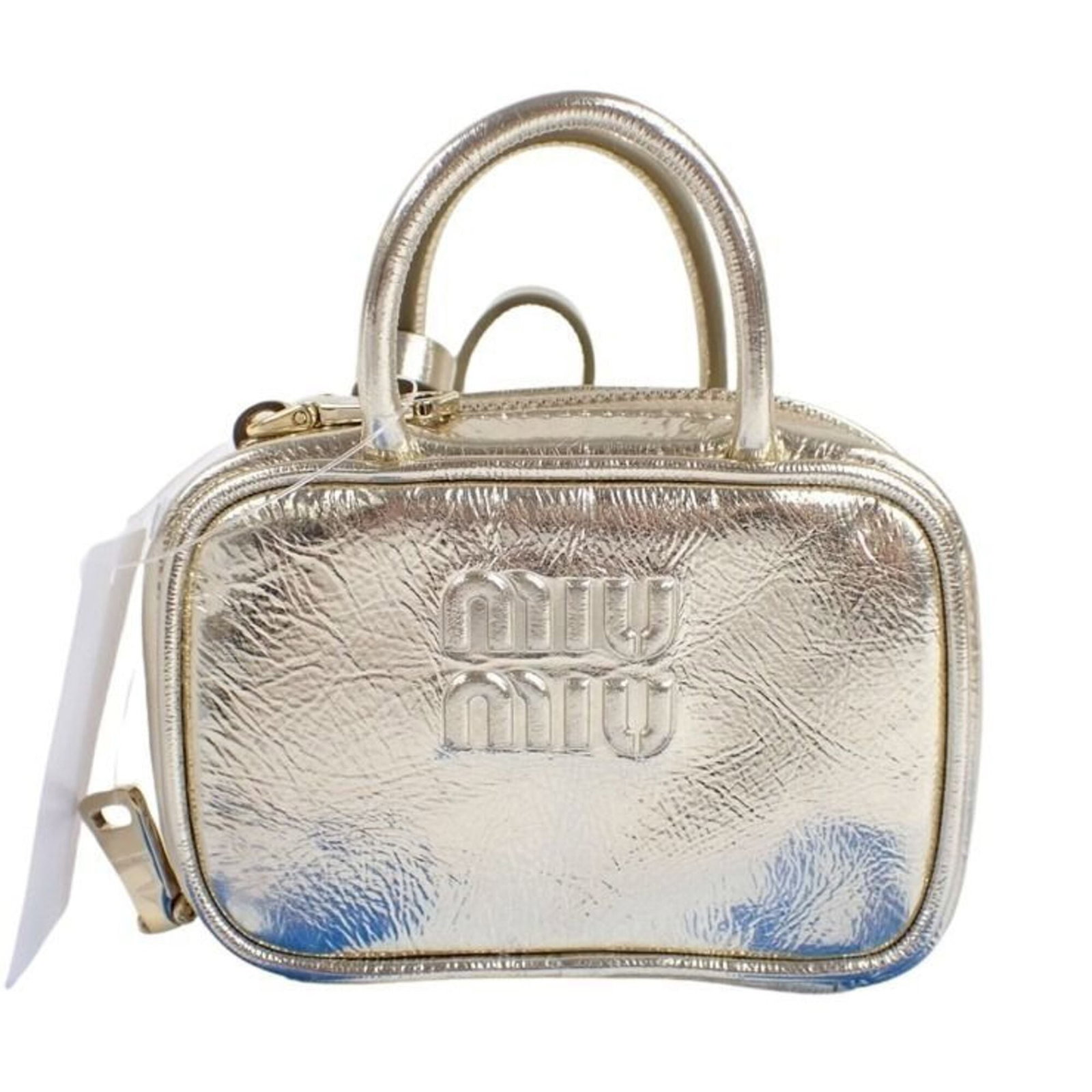 Miu Handbag Charm Leather: Miu Handbag Charm Leather Gold Miu Miu Handbag Charm, made from genuine leather, features a gold finish and measures 6.50mm x 10.00mm x 3.50mm in size. The charm bears a few traces of usage, including