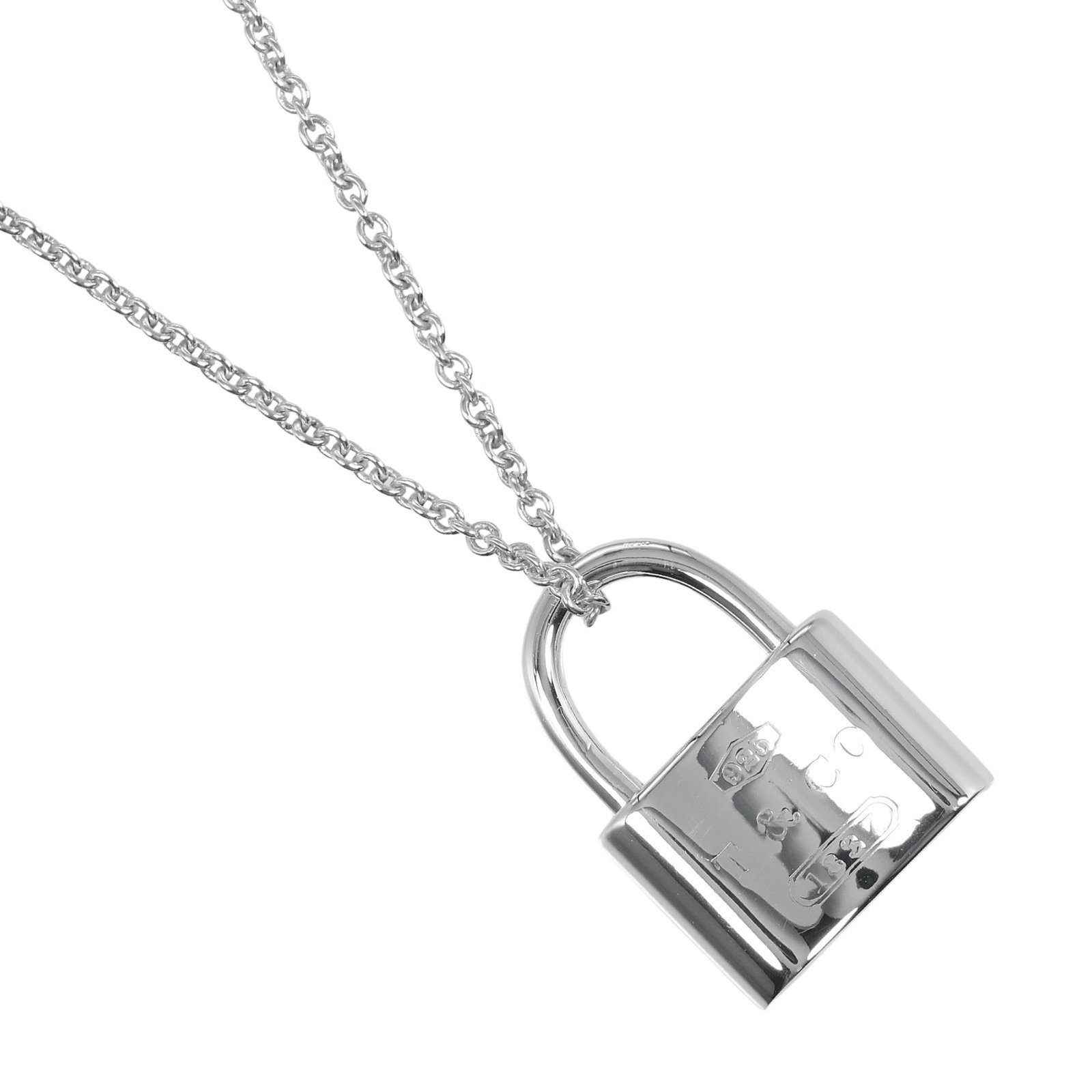 Sterling silver 925 necklace lock cadena for women by tiffany: Sterling silver 925 necklace lock cadena for women by tiffany Sterling silver 925 necklace lock cadena for women by Tiffany boasts a classic design with intricate details. The chain's 41.5 cm length a