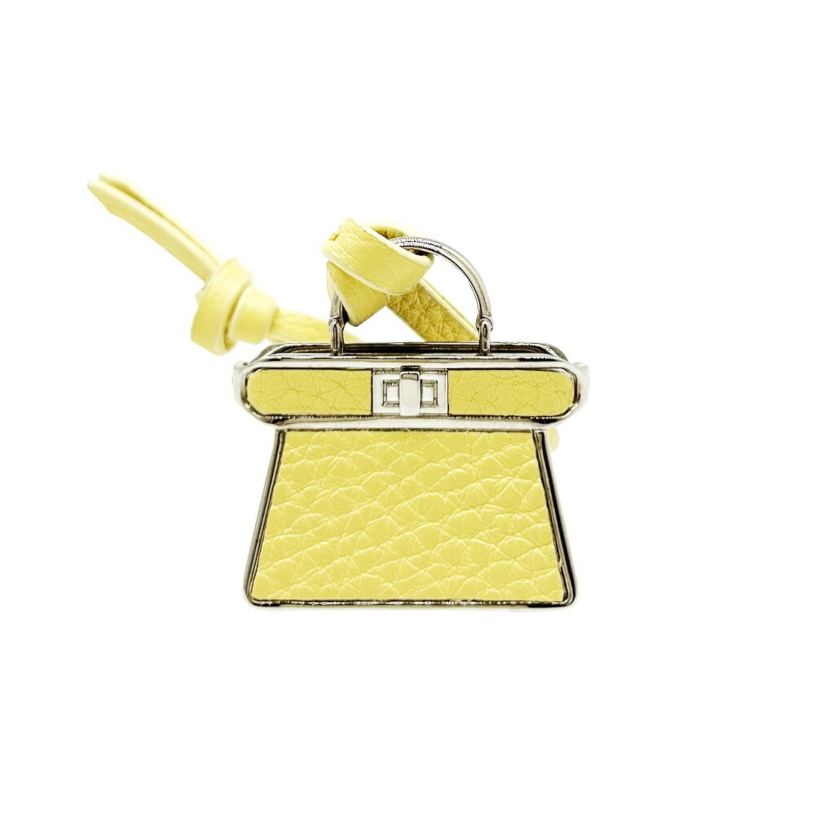 Fendi Handbag Charm Leather: Fendi Handbag Charm Leather Yellow Fendi Handbag Charm Leather, measuring 33.00mm x 24.00mm x 48.00mm, bears a signature and features a worn, yet vibrant yellow leather exterior with some scratches