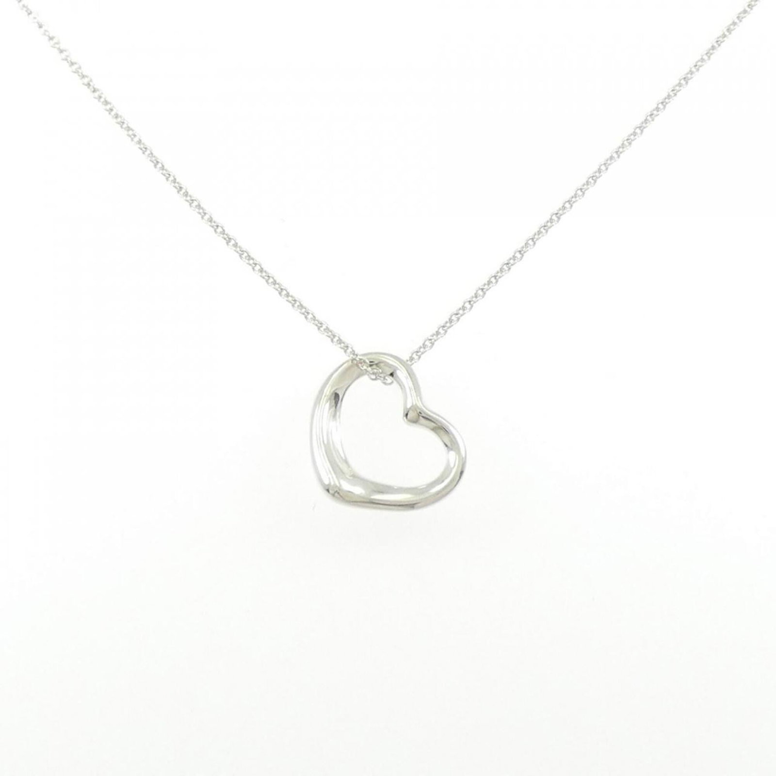 Heart Open Tiffany Necklace: Heart Open Tiffany Necklace Silver 925 Heart Open Tiffany Necklace, with a pendant size of 14.2mm x 13.6mm and a neck circumference of 42 cm / 16.53''. The necklace features a few traces of usage, som