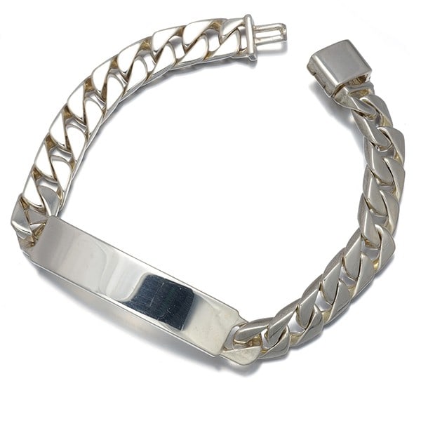 Sterling Silver Curb Chain Id Tiffany&Co. Bracelet: Sterling Silver Curb Chain Id Tiffany&Co. Bracelet Sterling silver curb chain bracelet from Tiffany & Co. features a classic chain design with no stone. Made from high-quality sterling silver (925), t