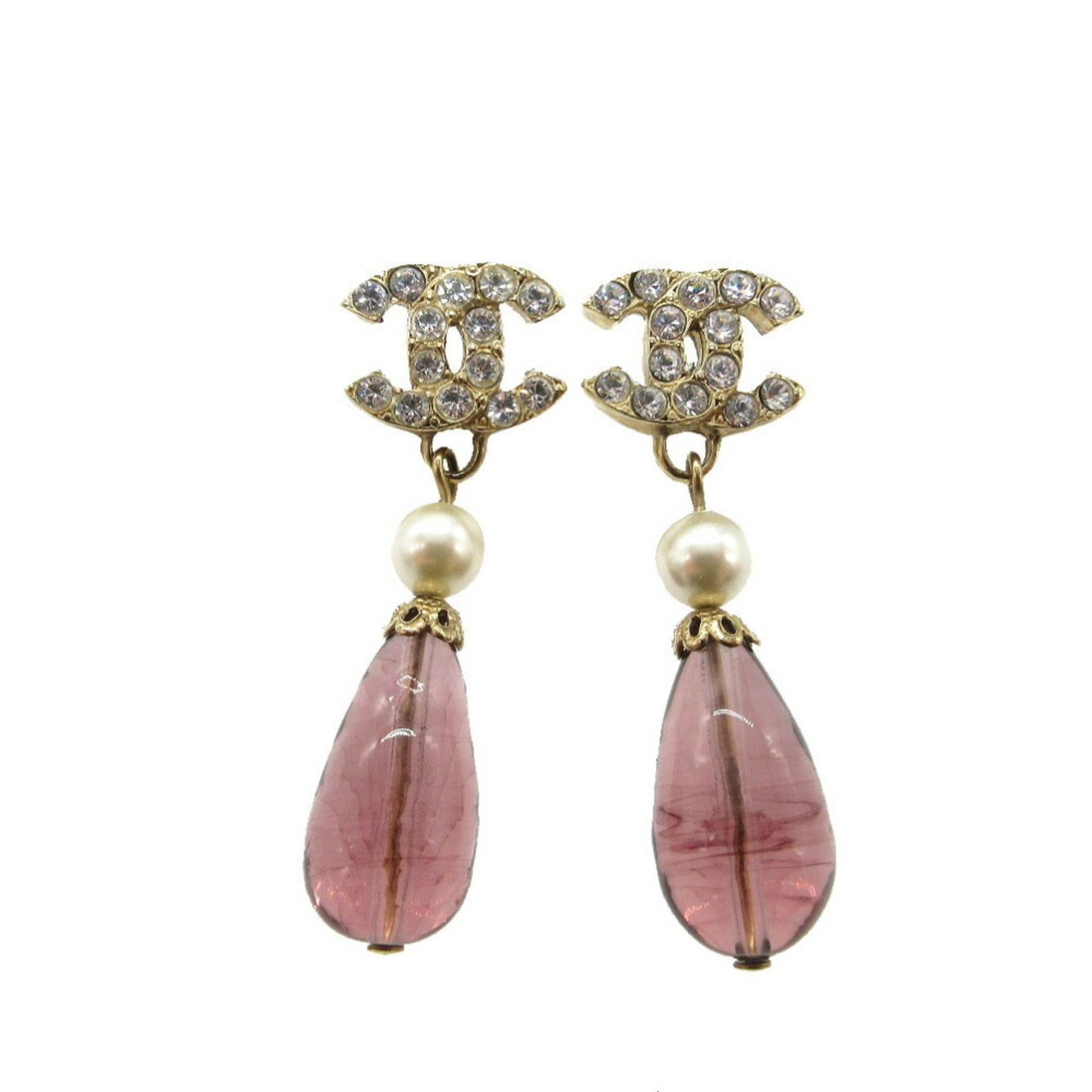 Chanel Drop Earrings Artificial Pearl Metal: Chanel Drop Earrings Artificial Pearl Metal Chanel Drop Earrings Artificial Pearl Metal are available in gold, purple, and white. These drop earrings feature artificial pearl details set against a met