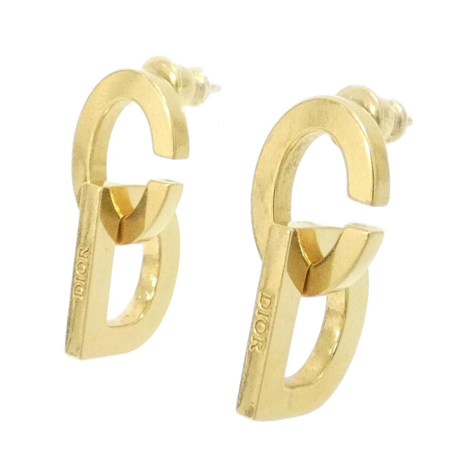Stud Earrings by Christian Dior: Stud Earrings by Christian Dior Gold stud earrings by Christian Dior, featuring a classic design with subtle details. The earrings are in very good condition, showing some minor scratches and dirt fro
