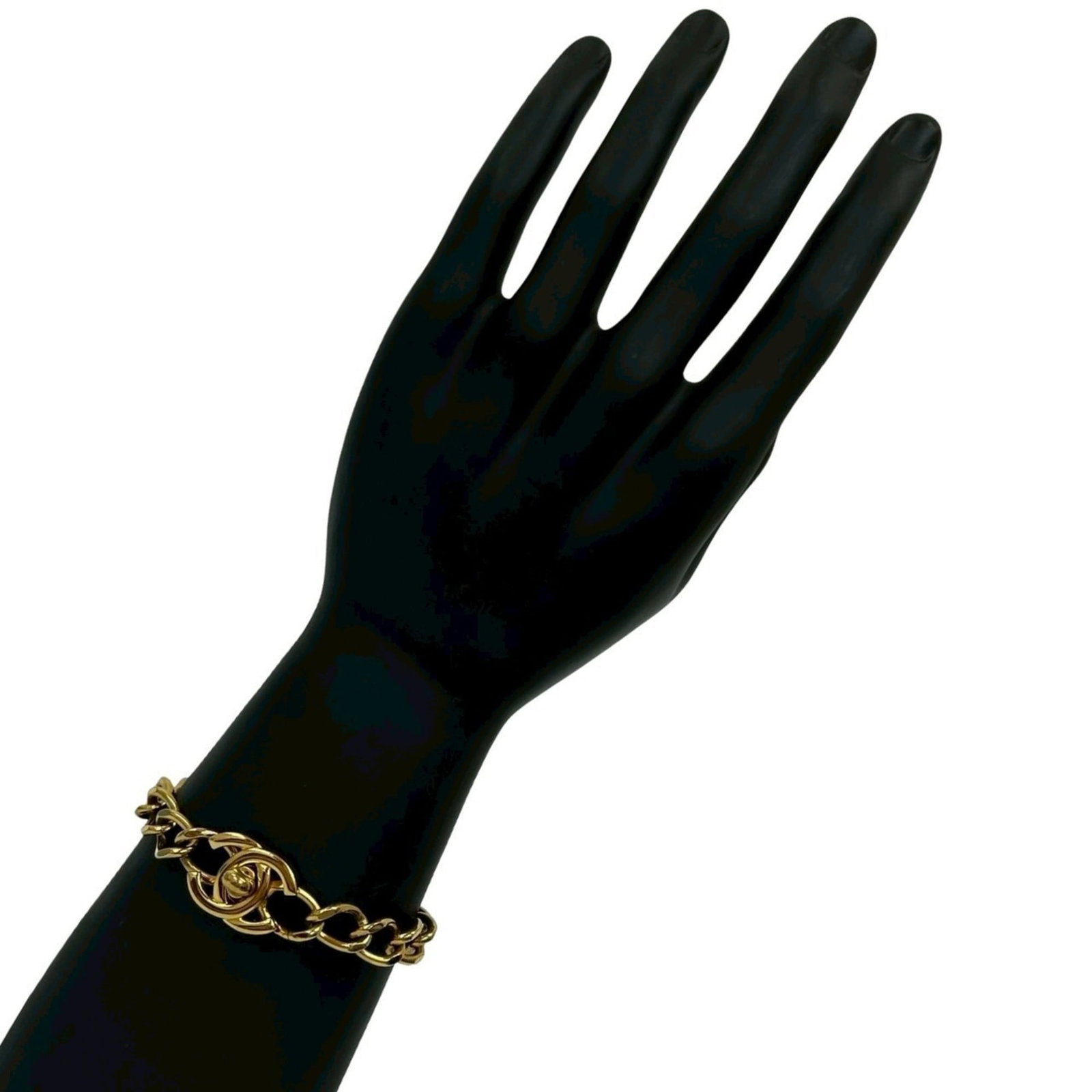 Chanel Charm Bracelet Gold Plating: Chanel Charm Bracelet Gold Plating Gold Plating adds a touch of luxury to this Chanel Charm Bracelet, featuring a gold-plated finish that gives it a sleek and sophisticated look. The bracelet measures