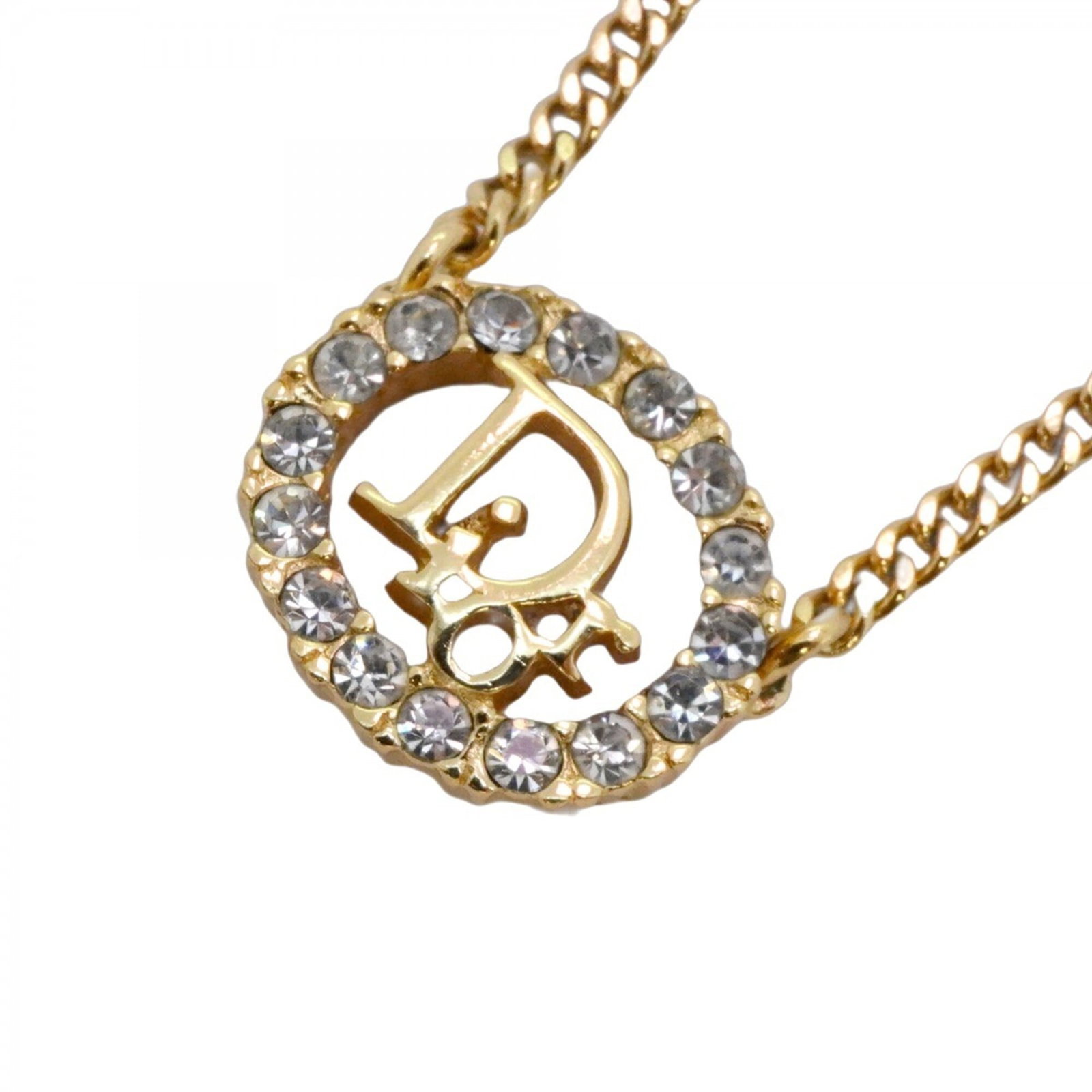 Christian Dior Oval Gold Women's Necklace Plated Rhinestone GP: Christian Dior Oval Gold Women's Necklace Plated Rhinestone GP Gold Oval Plated Rhinestone Necklace from Christian Dior. This elegant oval-shaped necklace features gold plating and rhinestones, with a