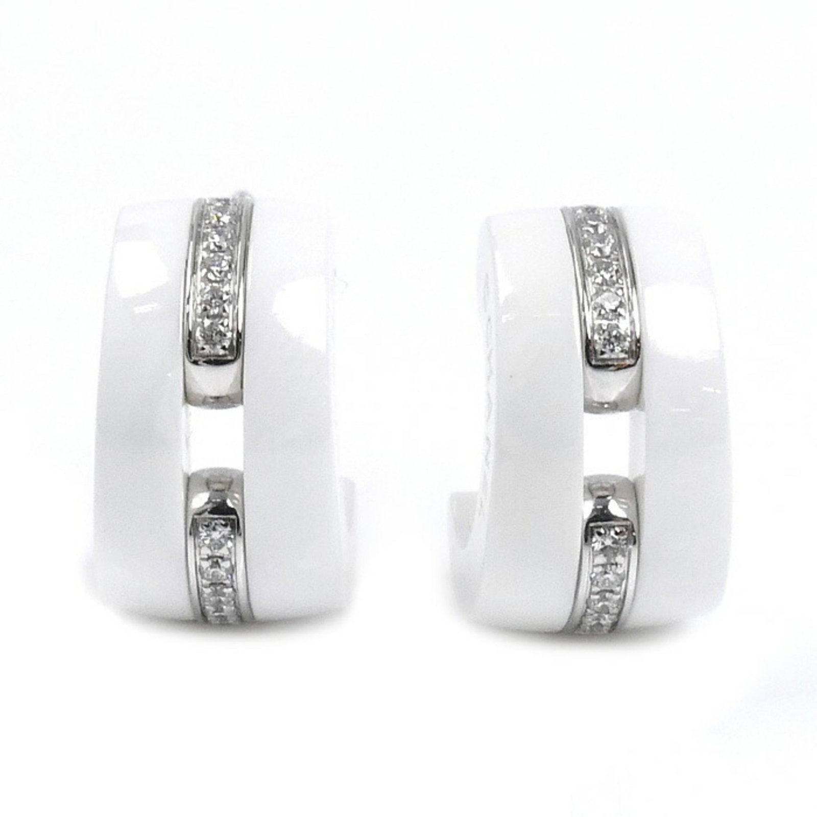 Ceramic White Gold 18K Chanel Stud Earrings: Ceramic White Gold 18K Chanel Stud Earrings Ceramic White Gold 18K Chanel Stud Earrings are crafted with ceramic and white gold (18K) materials, featuring a diamond stone. The earrings measure 13.70mm