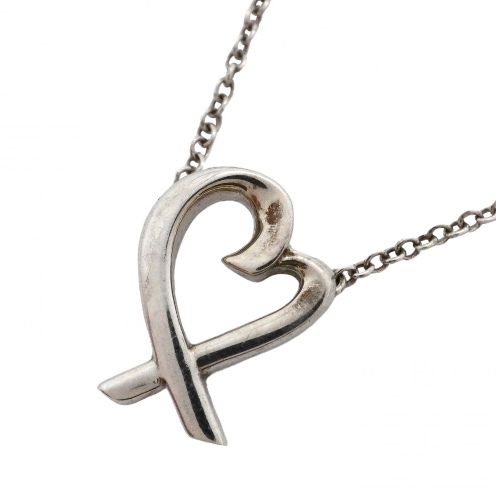 Silver necklace heart loving women's sterling tiffany co.: Silver necklace heart loving women's sterling tiffany co. Silver necklace heart loving women's sterling Tiffany Co. features a beautiful pendant with a 11.7mm x 8.8mm design, set in a silver 925 chain