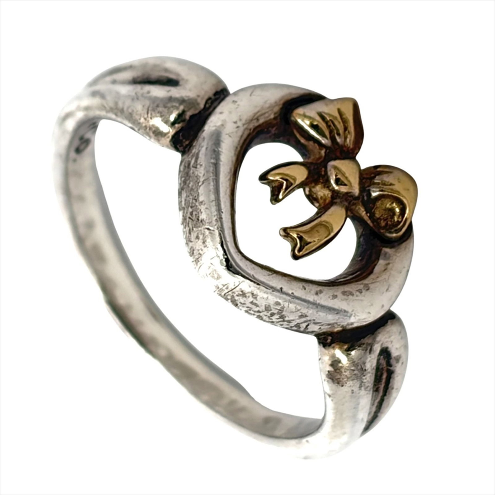 Tiffany Band Ring Silver 925 Yellow Gold (18K): Tiffany Band Ring Silver 925 Yellow Gold (18K) Silver 925, Yellow Gold (18K) construction adds durability and shine to this classic Tiffany band ring. The item bears a signature, but we cannot verify 