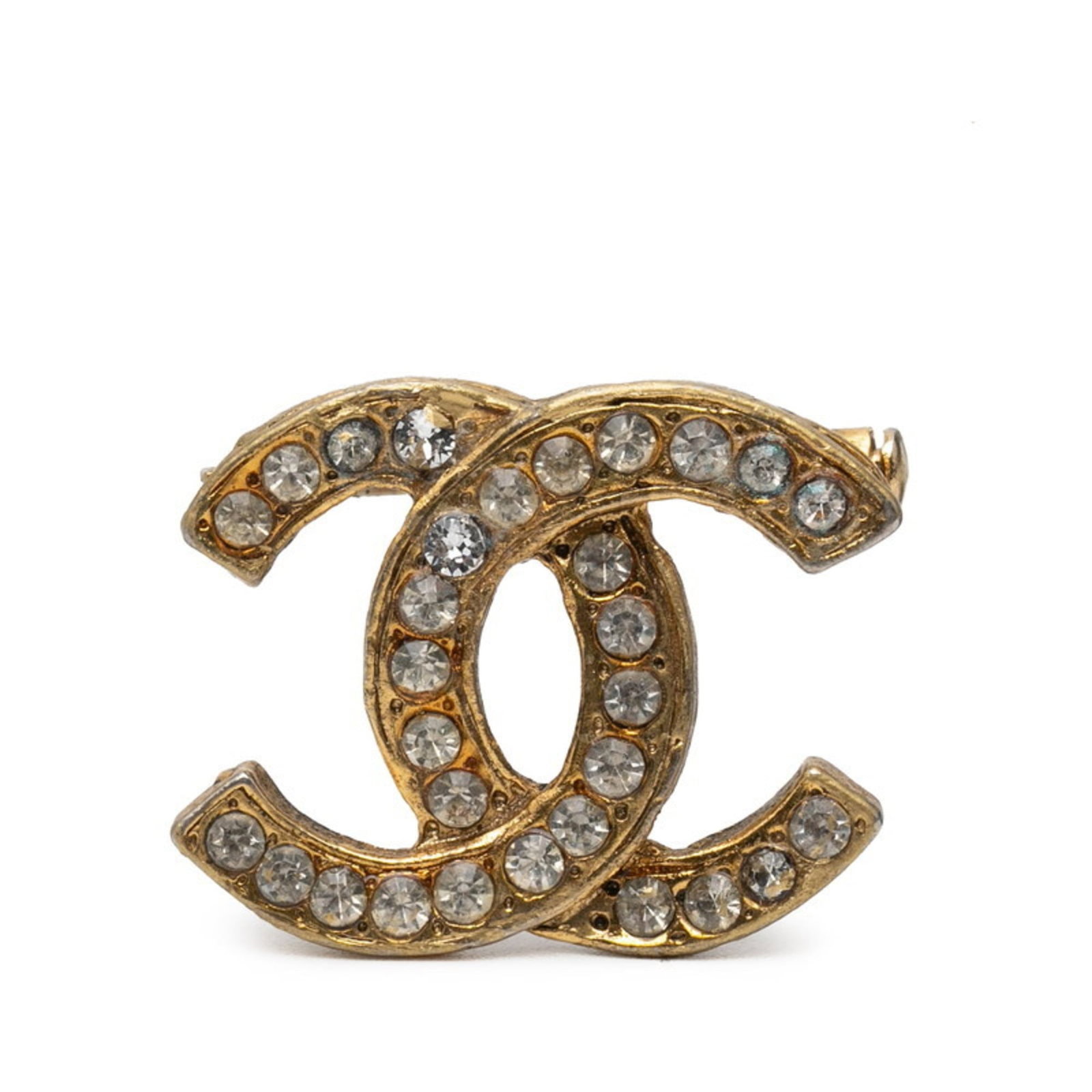Chanel Brooch: Chanel Brooch Gold Chanel Brooch with Rhinestone, featuring a classic design. Measuring 2.3cm x 2.89cm, it bears the signature of its creator but details about the artist are unknown. The brooch shows
