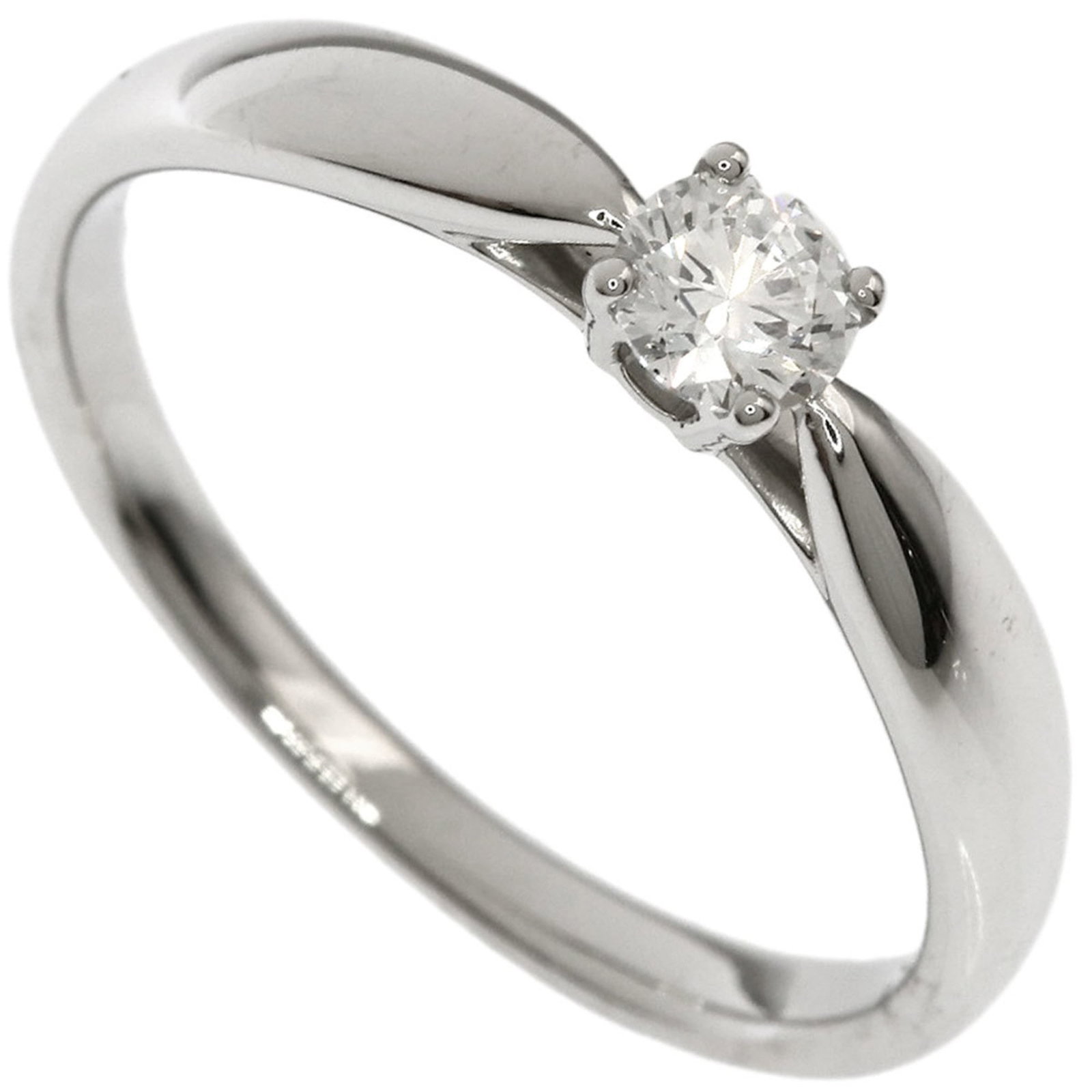Platinum ring by Tiffany band: Platinum ring by Tiffany band Platinum ring by Tiffany features a band design made from high-quality platinum. The item has some minor scratches and dirt, but remains in very good condition overall.
