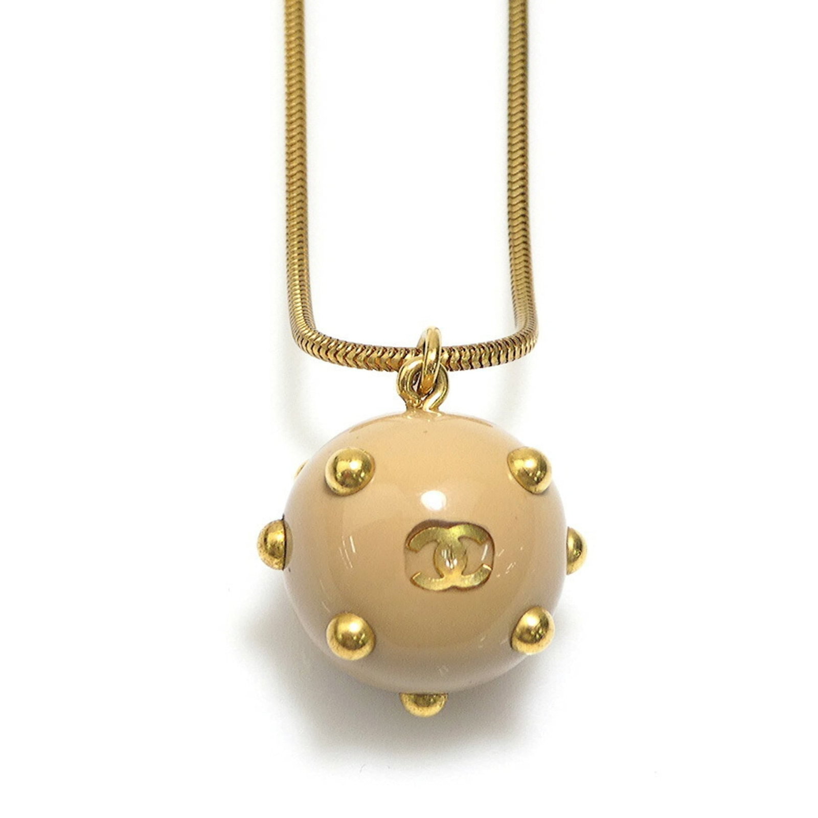 Coco Chanel Mark Gold Women's Beige Necklace Metal Resin: Coco Chanel Mark Gold Women's Beige Necklace Metal Resin Beige metal resin necklace with gold accents, featuring a 25mm x 20mm pendant in a classic design. The necklace measures 74 cm in circumference