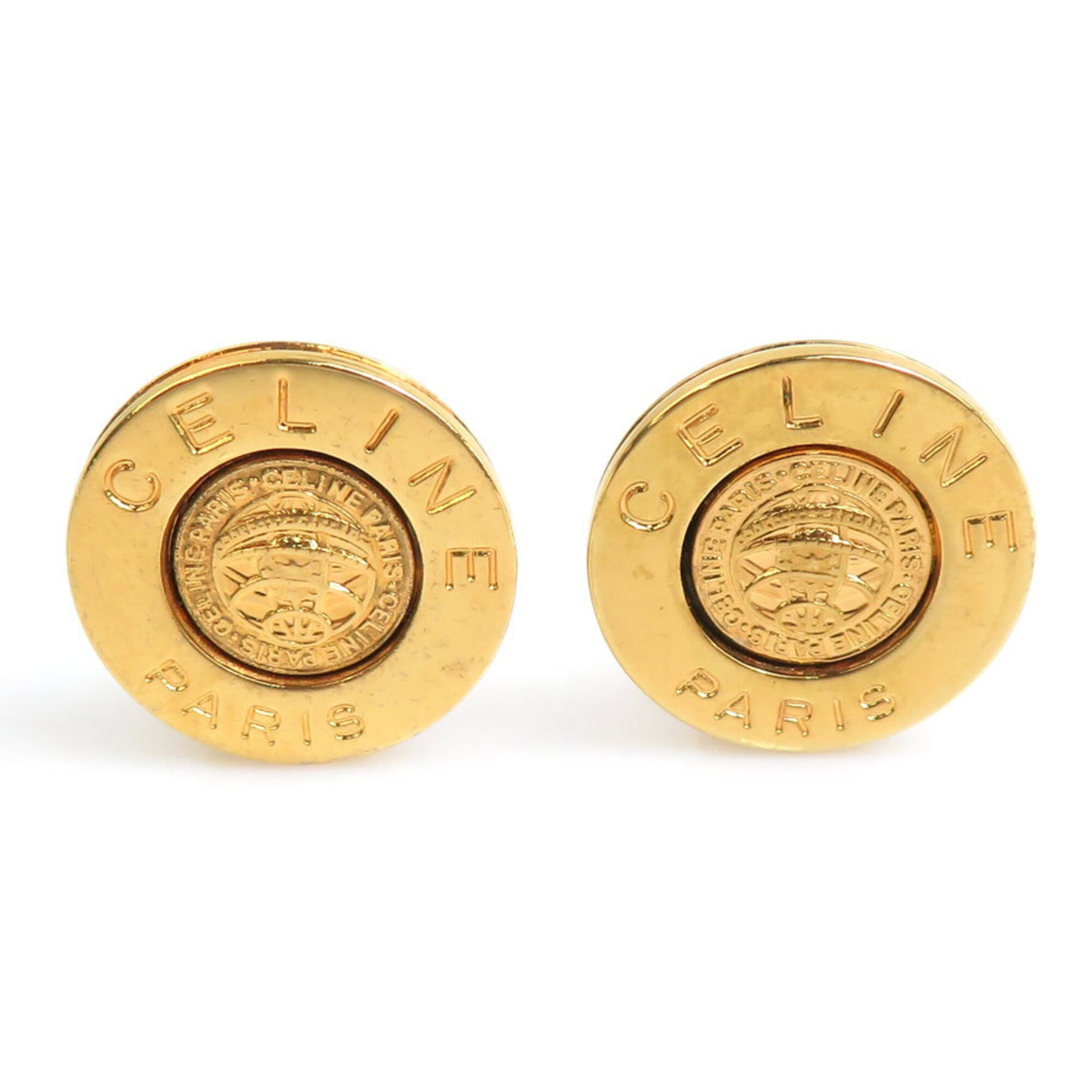 Clip earrings metal: Clip earrings metal Gold clip earrings with metal construction, bearing a signature. The item shows signs of usage, including scratches and dirt, but remains in good condition overall. Traces of wear 