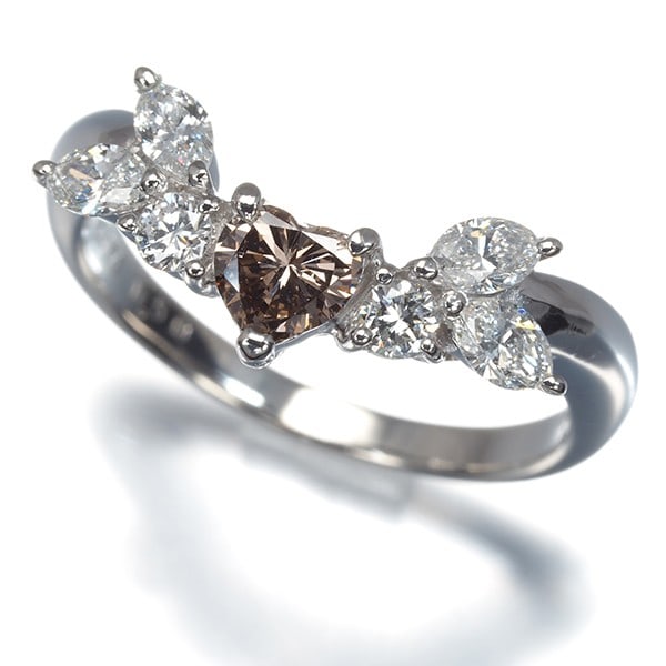 Brown &Clear Diamond 0.274Ct/ 0.50Ct Heart Shape Ring 900 Platinum: Brown &Clear Diamond 0.274Ct/ 0.50Ct Heart Shape Ring 900 Platinum 900 platinum metal purity and natural diamond create a striking combination in this heart-shaped ring. The main stone, weighing