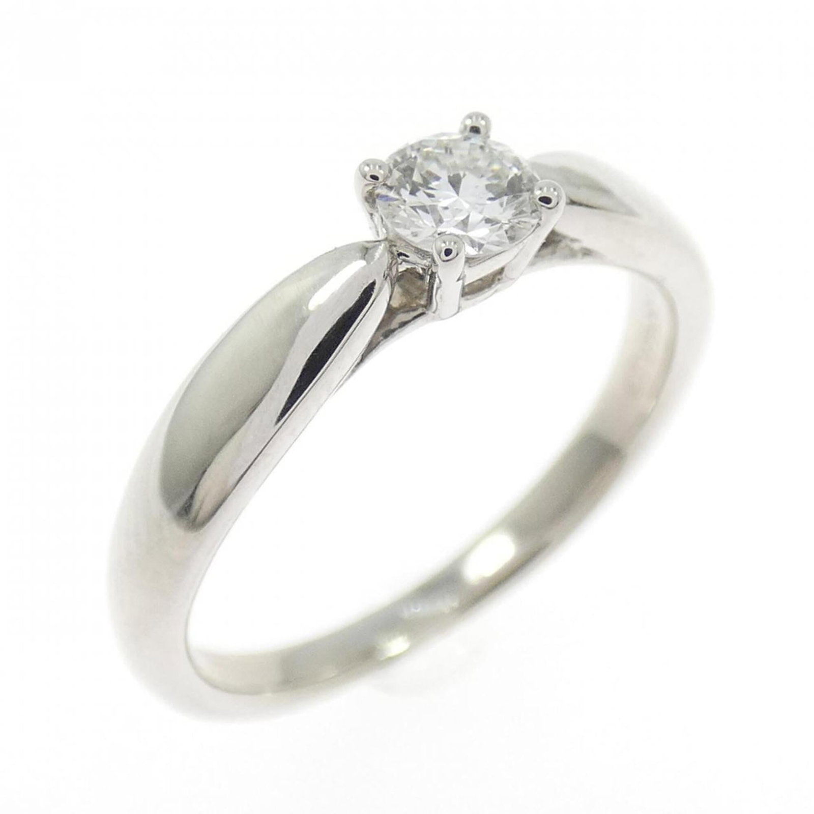 Platinum ring by Tiffany band: Platinum ring by Tiffany band Platinum ring by Tiffany features a diamond stone weighing 0.18 carats, set in a high-quality platinum band with a Vs2 clarity. This 3.5 US size ring showcases the luxury