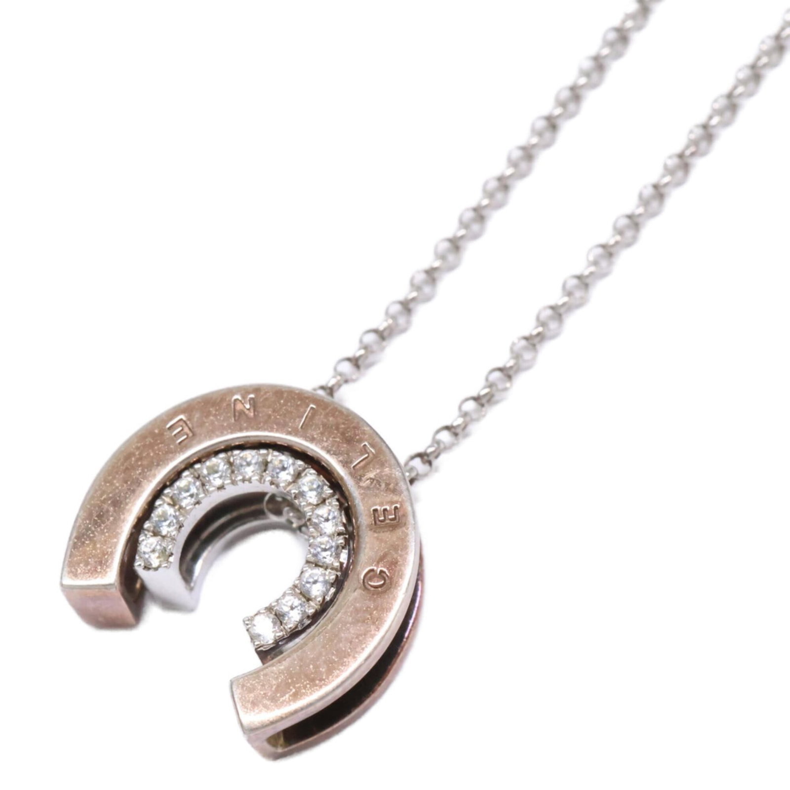 Silver Celine 925 Rhinestone Horseshoe Necklace for Women: Silver Celine 925 Rhinestone Horseshoe Necklace for Women Silver Celine 925 Rhinestone Horseshoe Necklace for Women features a striking silver design adorned with rhinestones, measuring 14mm x 13mm. T