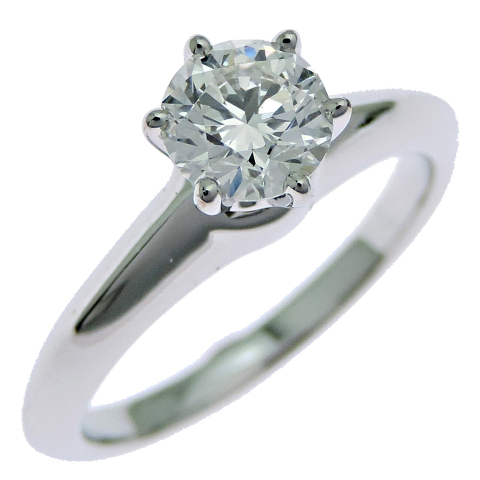 Platinum ring by Tiffany band: Platinum ring by Tiffany band Platinum ring by Tiffany & Co. boasts a sleek design, featuring a diamond stone set in a high-quality platinum band. The ring is made from 950 platinum and falls within a