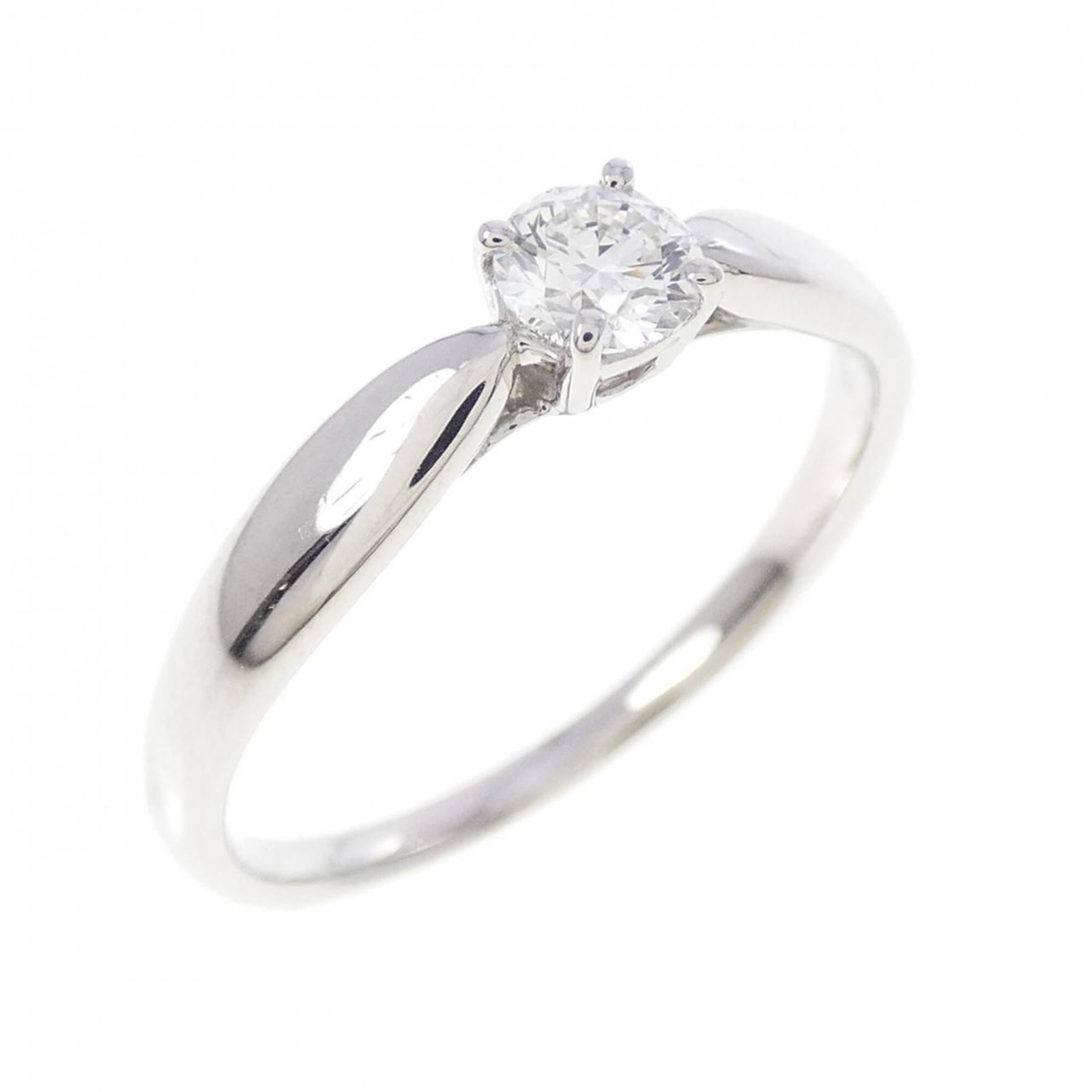 Platinum ring by Tiffany band: Platinum ring by Tiffany band Platinum ring by Tiffany features a diamond stone weighing 0.21 carats, set in a high-quality platinum band with a US size 6 fit. The ring bears some minor scratches and