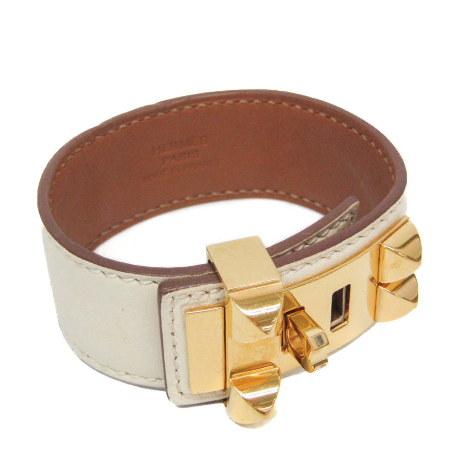 Metal leather bangle Hermes: Metal leather bangle Hermes Gold and white metal bangle with leather accents, measuring 14cm-15.5cm in length and 2.29cm in width, featuring a mix of metallic and textured details. This used Hermes