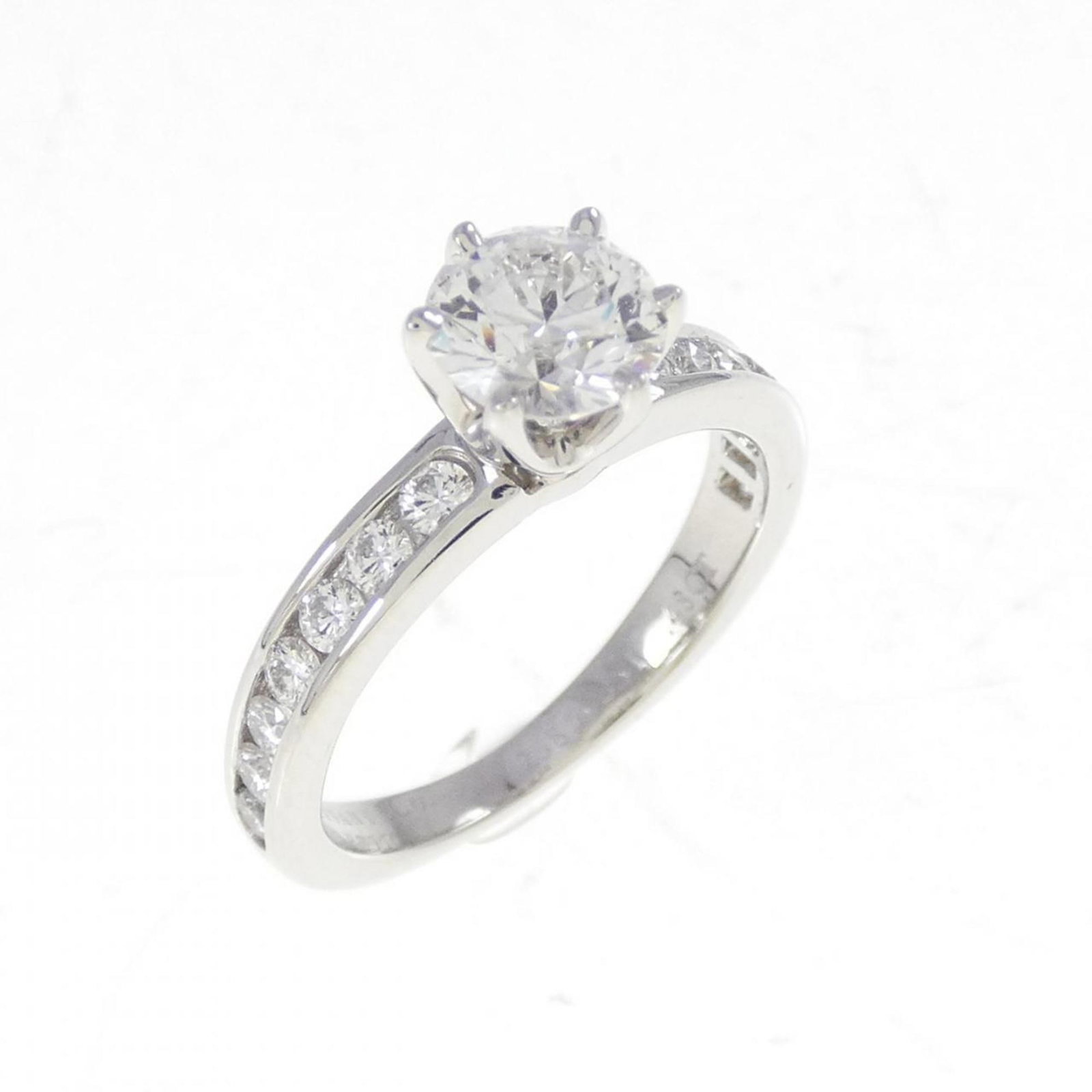 Platinum ring by Tiffany band: Platinum ring by Tiffany band Platinum ring by Tiffany features a 0.48 carat diamond stone set in a band design, crafted from high-quality platinum material. This like-new condition ring boasts hardly