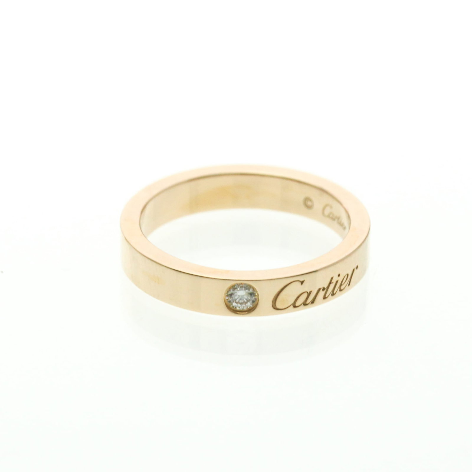Pink gold 18k ring band from Cartier: Pink gold 18k ring band from Cartier Pink gold 18k Cartier ring band, featuring a sleek and sophisticated design. This 46mm pink gold band boasts a delicate width of 3.1mm and weighs 3.4g, making it