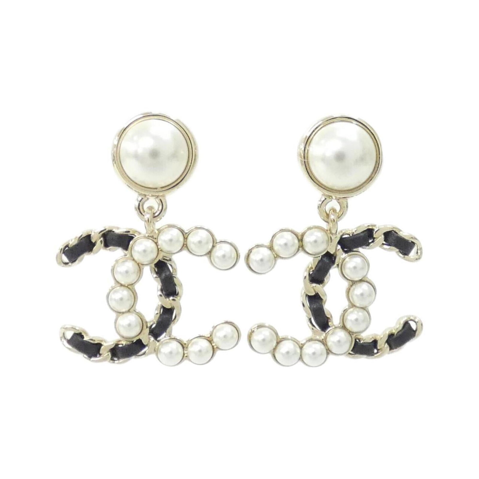 Chanel Stud Earrings Leather: Chanel Stud Earrings Leather Chanel's iconic stud earrings are crafted from supple black leather, adding an edgy touch to any outfit. The classic design features a minimalist aesthetic and a subtle go
