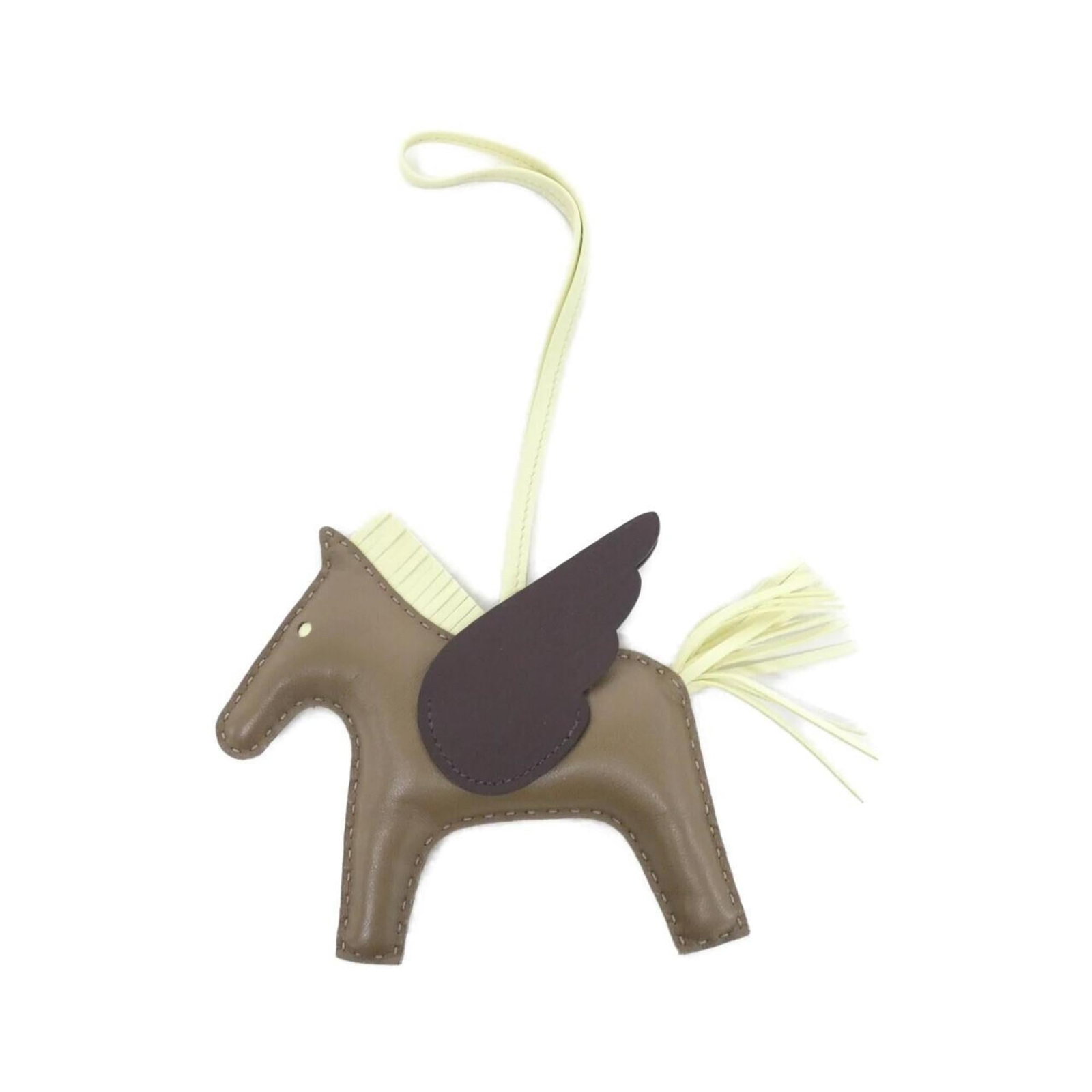 Hermes Handbag Charm Agneau Milo: Hermes Handbag Charm Agneau Milo Agneau Milo handbag charm from Hermes, featuring a beautiful brown, etoupe gray, and Jaune color combination. This used (very good) charm boasts a chain length of