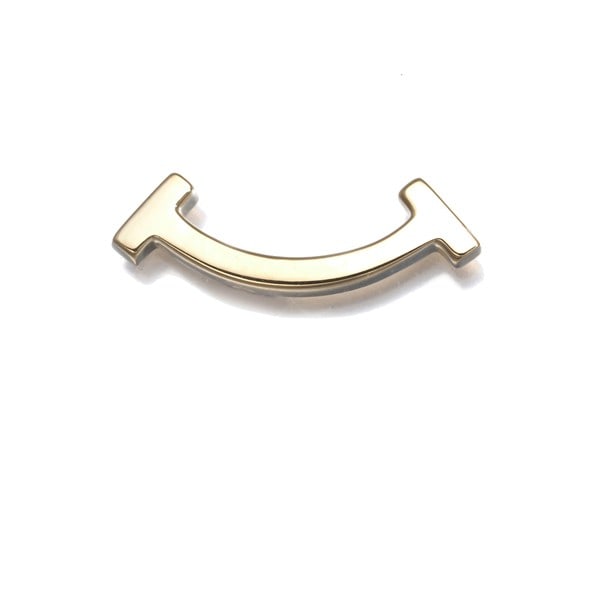 Single Earring Tiffany T Smile 18K Yellow Gold: Single Earring Tiffany T Smile 18K Yellow Gold Single Earring Tiffany T Smile 18K Yellow Gold. This single earring features the iconic Tiffany & Co. design, crafted from 18k yellow gold. The stud-styl