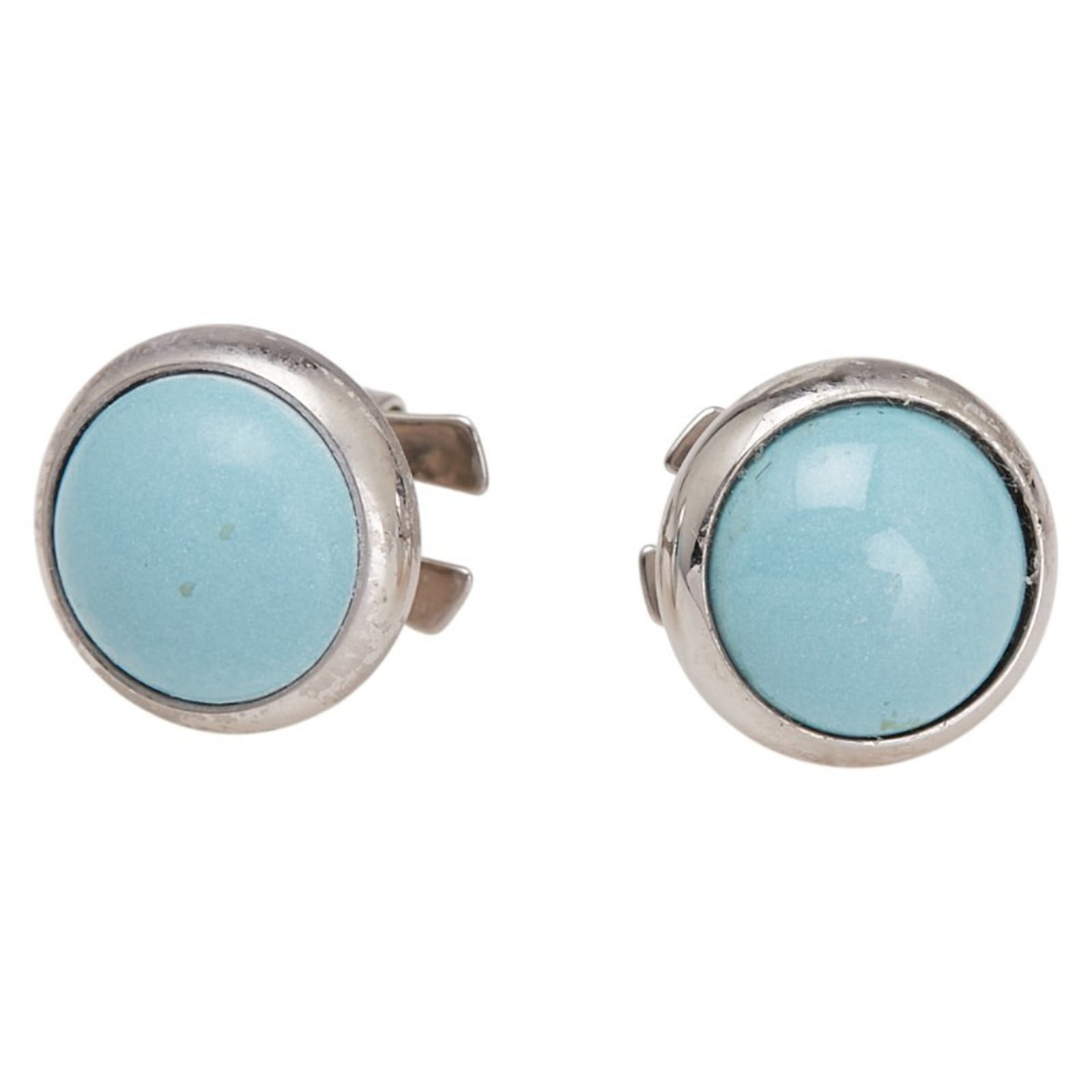 Hermes Stud Earrings Metal: Hermes Stud Earrings Metal Stud earrings in light blue and silver, featuring the iconic Hermes design. Made from metal, these earrings have a classic stud style with a subtle shine. With a small size 