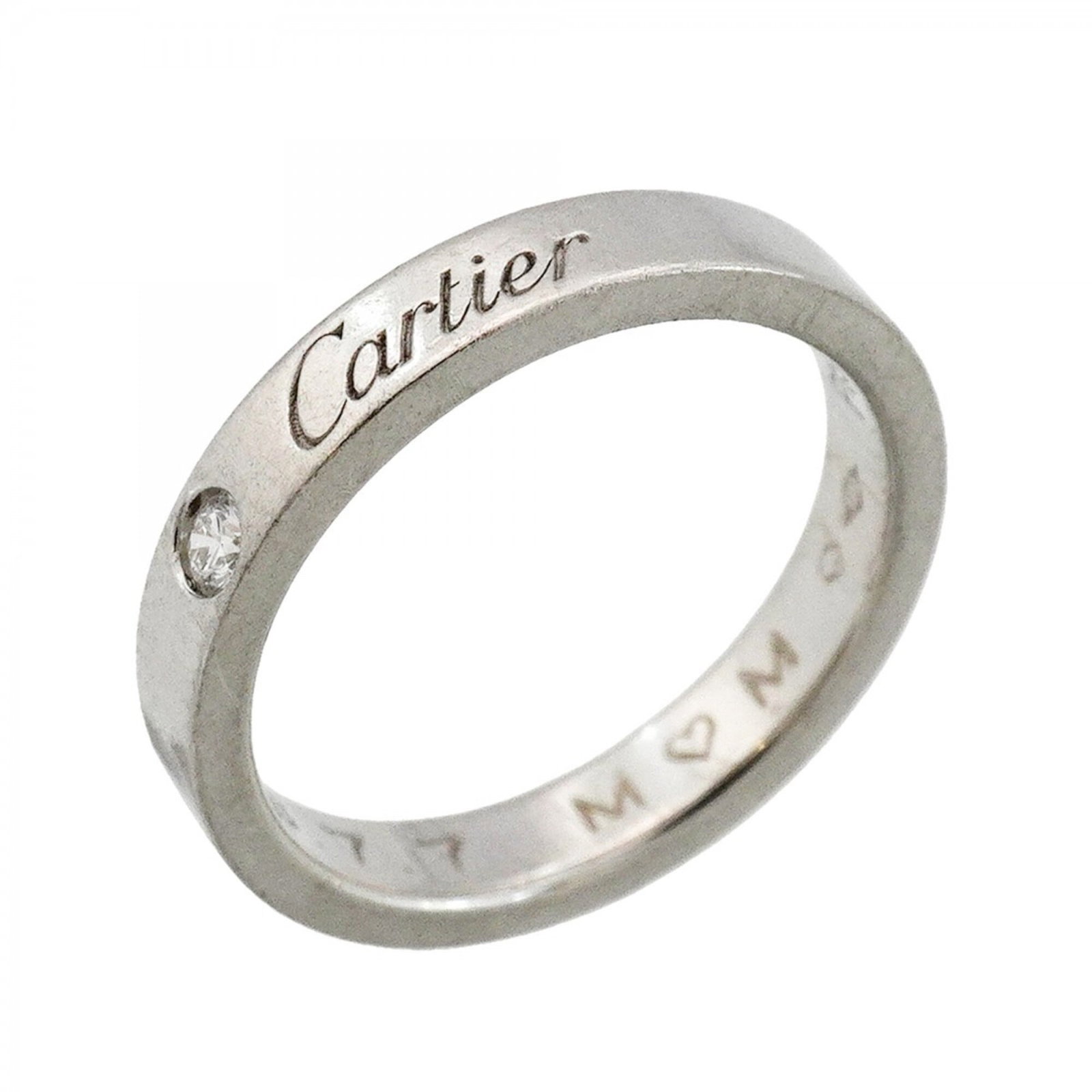 Ring Band by Platinum 950: Ring Band by Platinum 950 Platinum 950 ring band by Cartier, featuring a diamond stone and a classic design. This used band is in acceptable condition with traces of usage, and may show some damages o