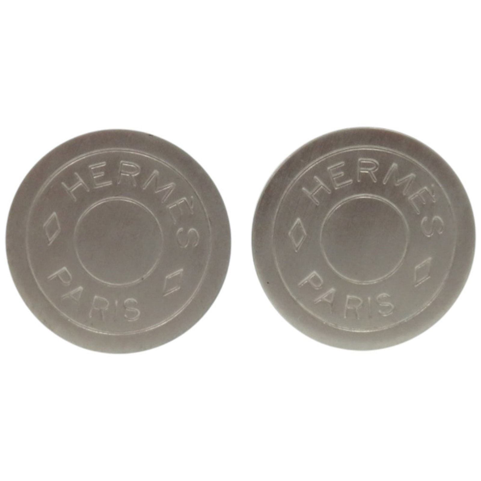 Metal Clip Hermes Earrings: Metal Clip Hermes Earrings Silver Metal Clip Hermes Earrings with A Few Traces of Usage, Some Scratches / Dirt. Made from high-quality metal, these clip earrings feature the iconic Hermes design. In v