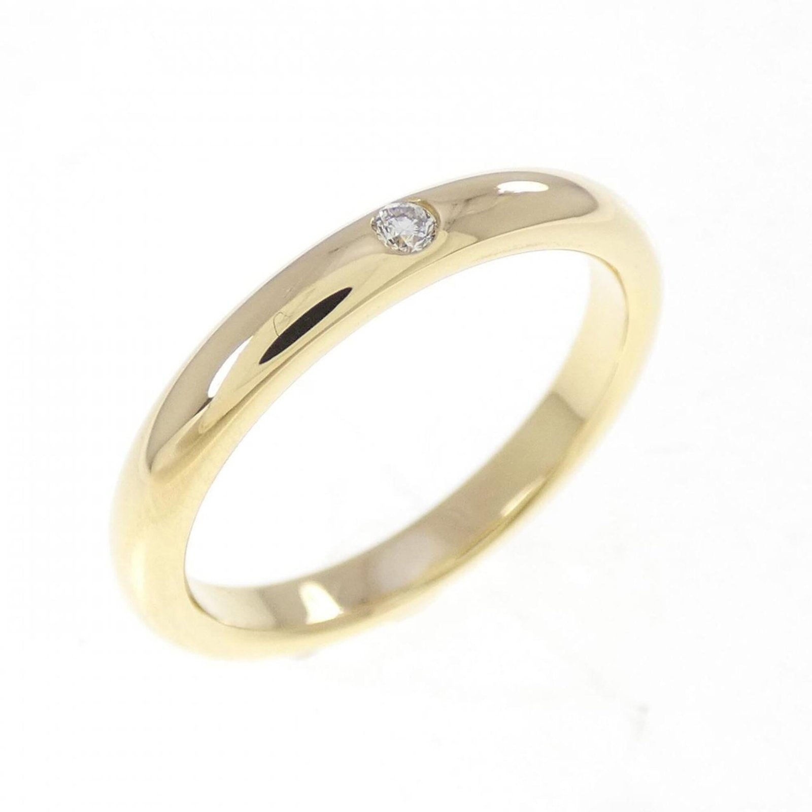 Tiffany Ring Gold Yellow 18K: Tiffany Ring Gold Yellow 18K Tiffany Ring Gold Yellow 18K - A Timeless Elegance. This beautiful band ring features a diamond stone set in yellow gold (18K), showcasing a classic design that exudes sop
