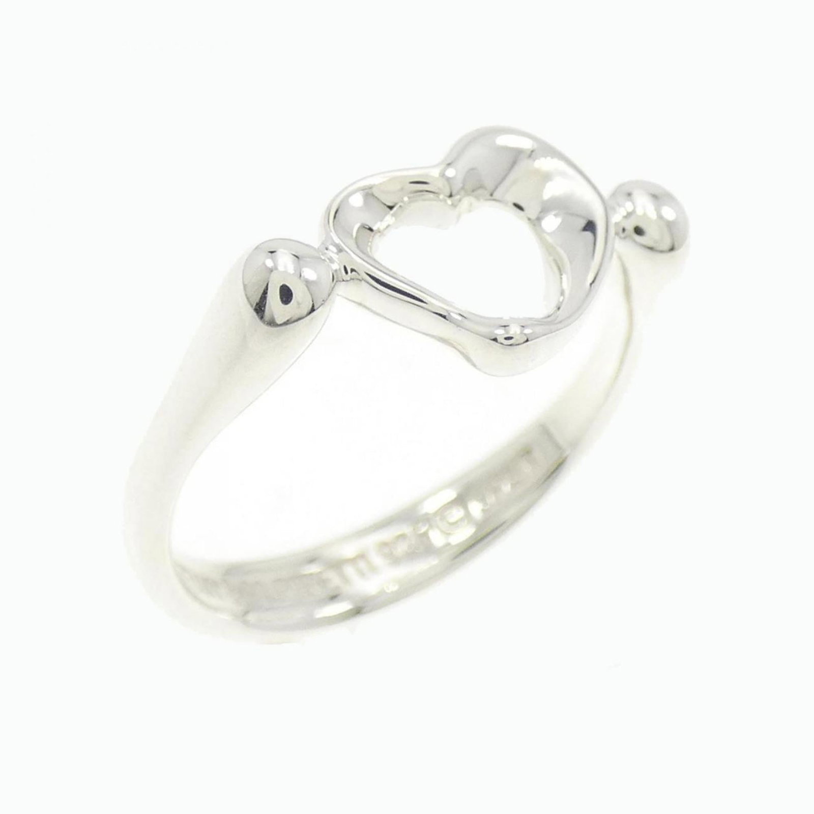 Tiffany Band Ring: Tiffany Band Ring Silver Tiffany band ring, featuring a classic design with a few traces of usage visible. The ring bears a signature and is made from sterling silver (925). In very good condition, wi
