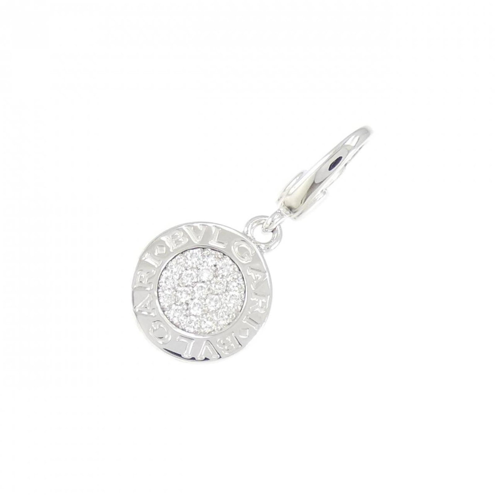 Bvlgari Handbag Charm White Gold (18K): Bvlgari Handbag Charm White Gold (18K) White Gold (18K) Bvlgari Handbag Charm boasts a stunning diamond setting, measuring 28.50mm x 13.10mm, adding a touch of elegance to any accessory. This used cha