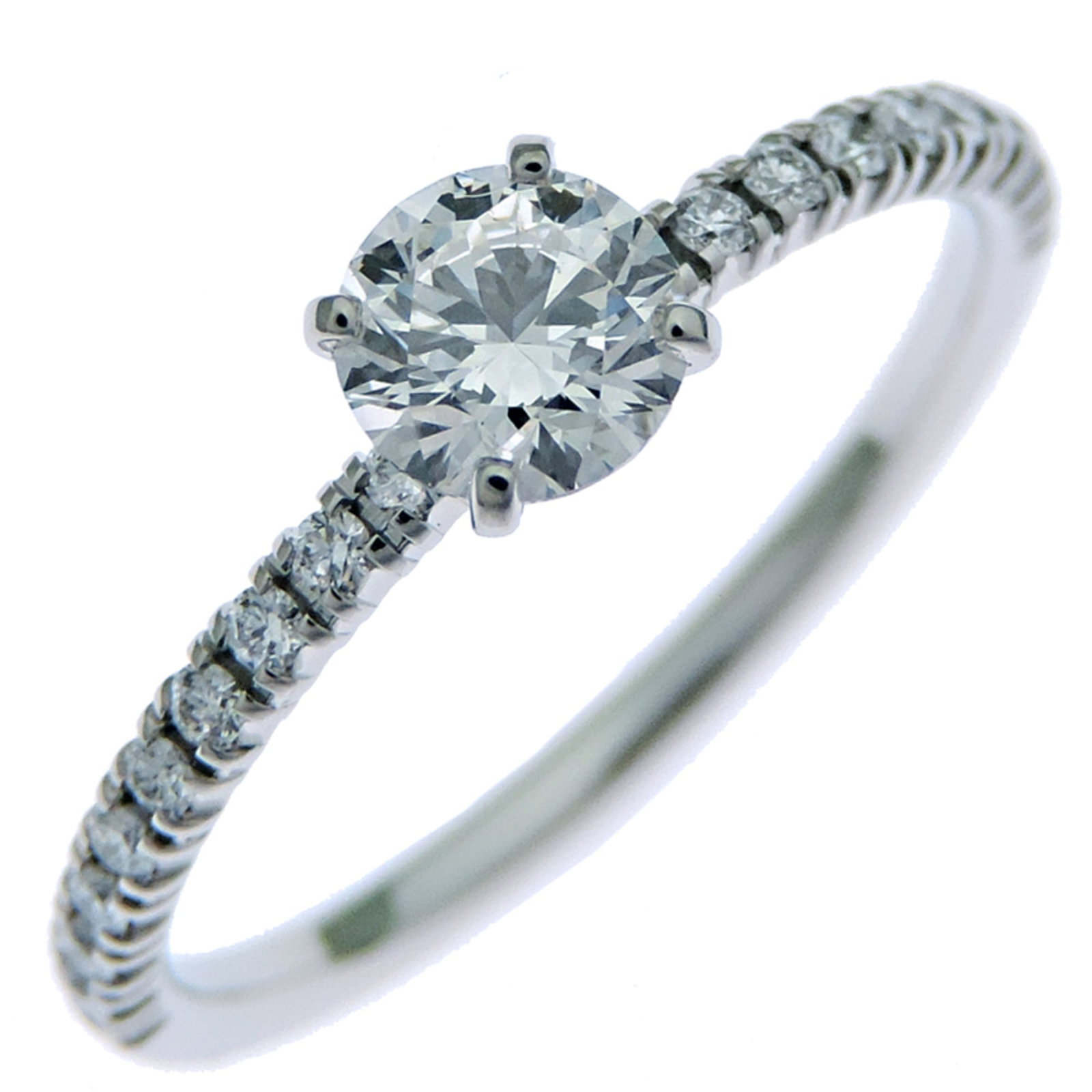 Ring Band by Platinum 950: Ring Band by Platinum 950 Platinum 950 band ring by Cartier, featuring a diamond stone and available in women's US size 4.5. The ring bears some signs of usage, including minor scratches and dirt, but