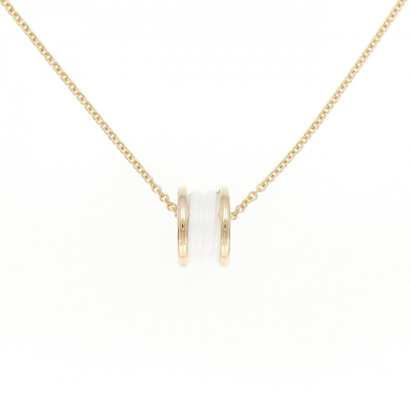 Bvlgari B.Zero1 Necklace: Bvlgari B.Zero1 Necklace Bvlgari B.Zero1 Necklace in Pink Gold features a ceramic pendant with a unique design, crafted from 18K pink gold. Measuring 14.7mm x 9.2mm and weighing 12.4g, it boasts a dis