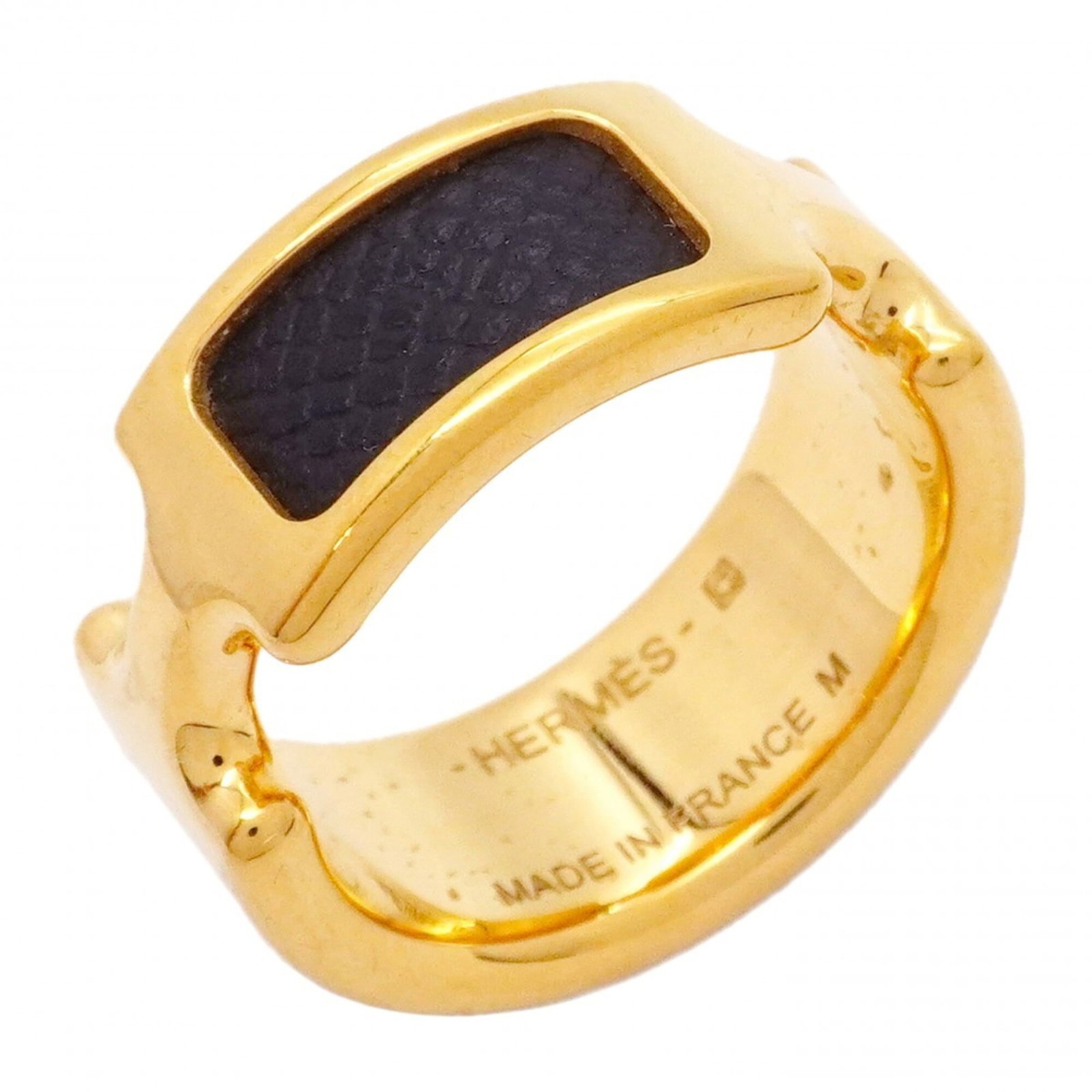 Hermes Band Ring Gold Plating Leather: Hermes Band Ring Gold Plating Leather Gold Plated Leather Band Ring from Hermes Features Black and Gold Accents, with Traces of Usage Showing. Made from High-Quality Gold Plating and Soft Leather, Thi
