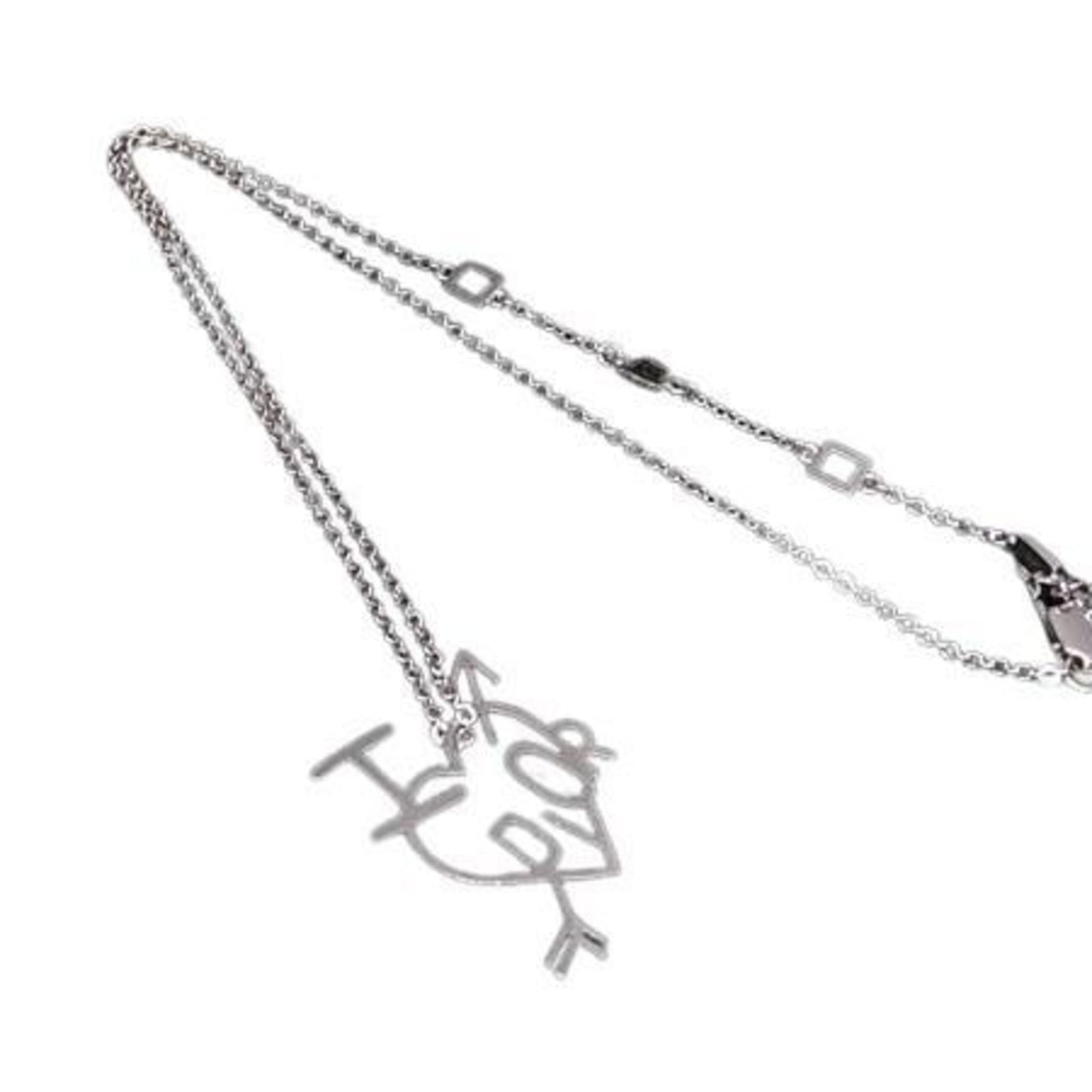 Christian Dior Women's Necklace Heart Arrow Silver Metal: Christian Dior Women's Necklace Heart Arrow Silver Metal Silver metal Christian Dior necklace features a delicate heart arrow pendant, adding a touch of elegance to any outfit. The necklace boasts a