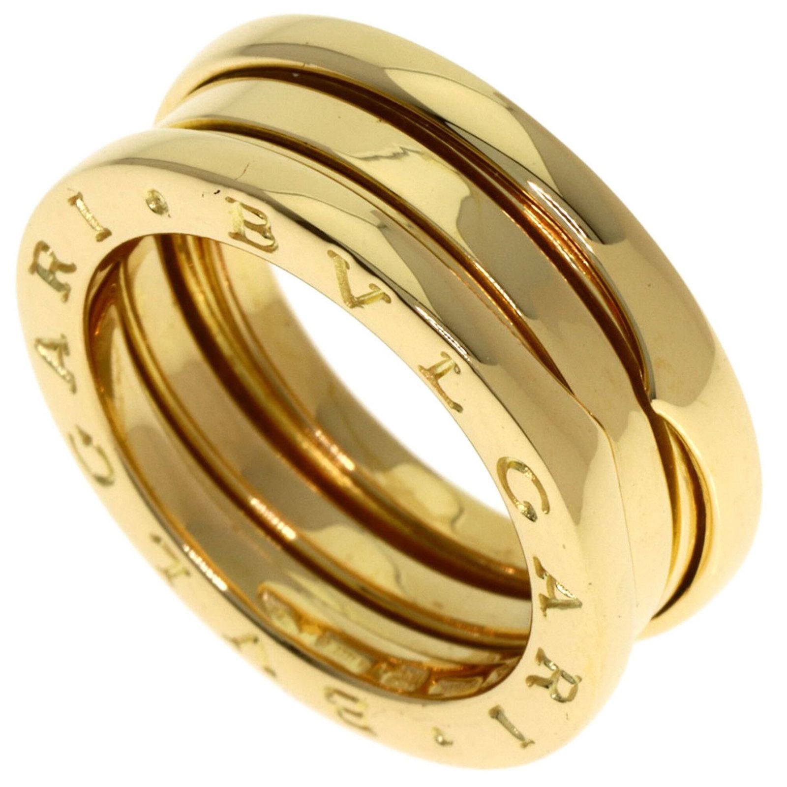 Bvlgari Band Ring Yellow Gold (18K): Bvlgari Band Ring Yellow Gold (18K) Yellow gold Bvlgari band ring with 18K material, featuring a classic design and subtle yellow hue. The ring showcases a few traces of usage, some minor scratches