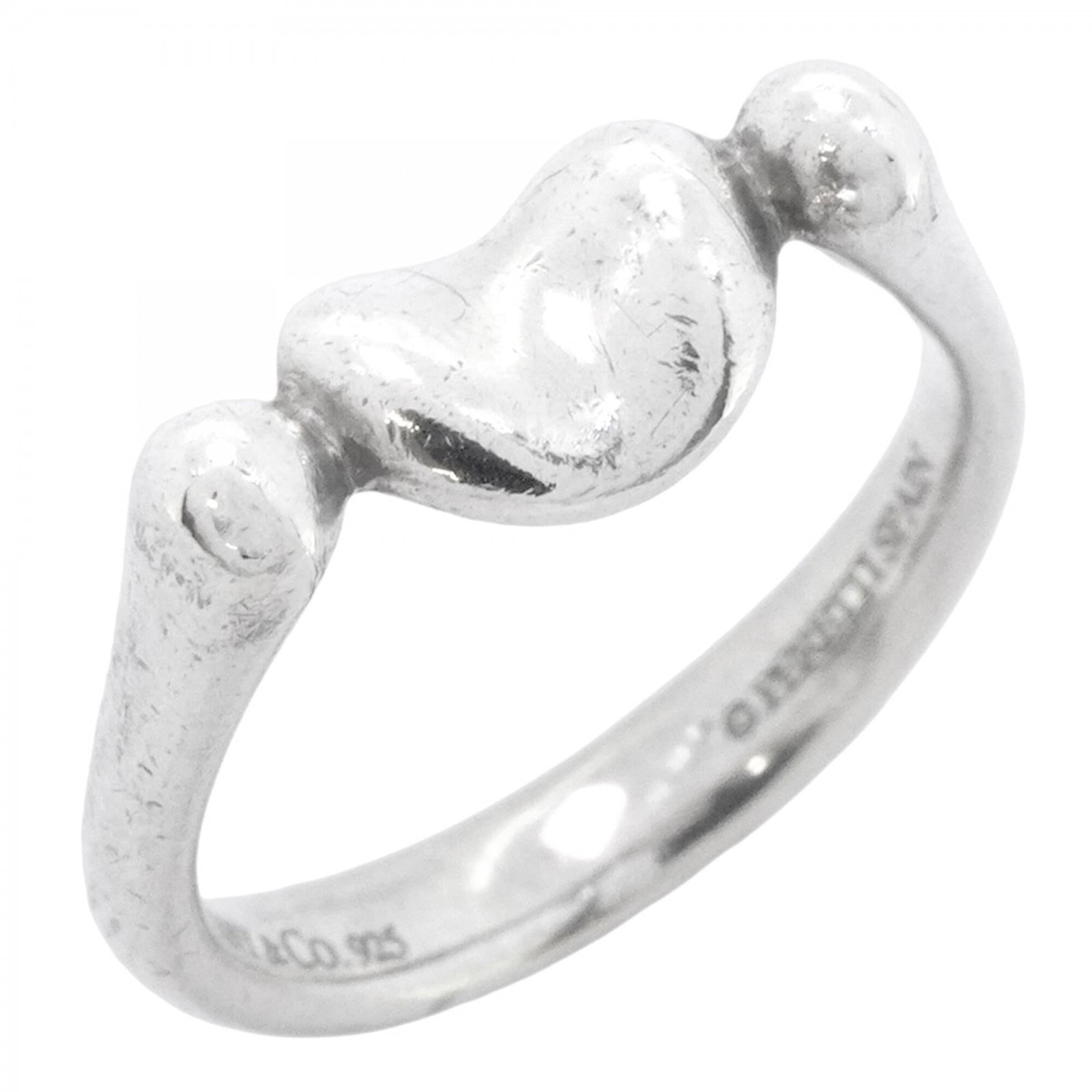 Tiffany Band Ring Silver 925: Tiffany Band Ring Silver 925 Silver 925 band ring from Tiffany, featuring a classic design with subtle wear and minor scratches. The item bears the brand's mark and has been used, showing signs of
