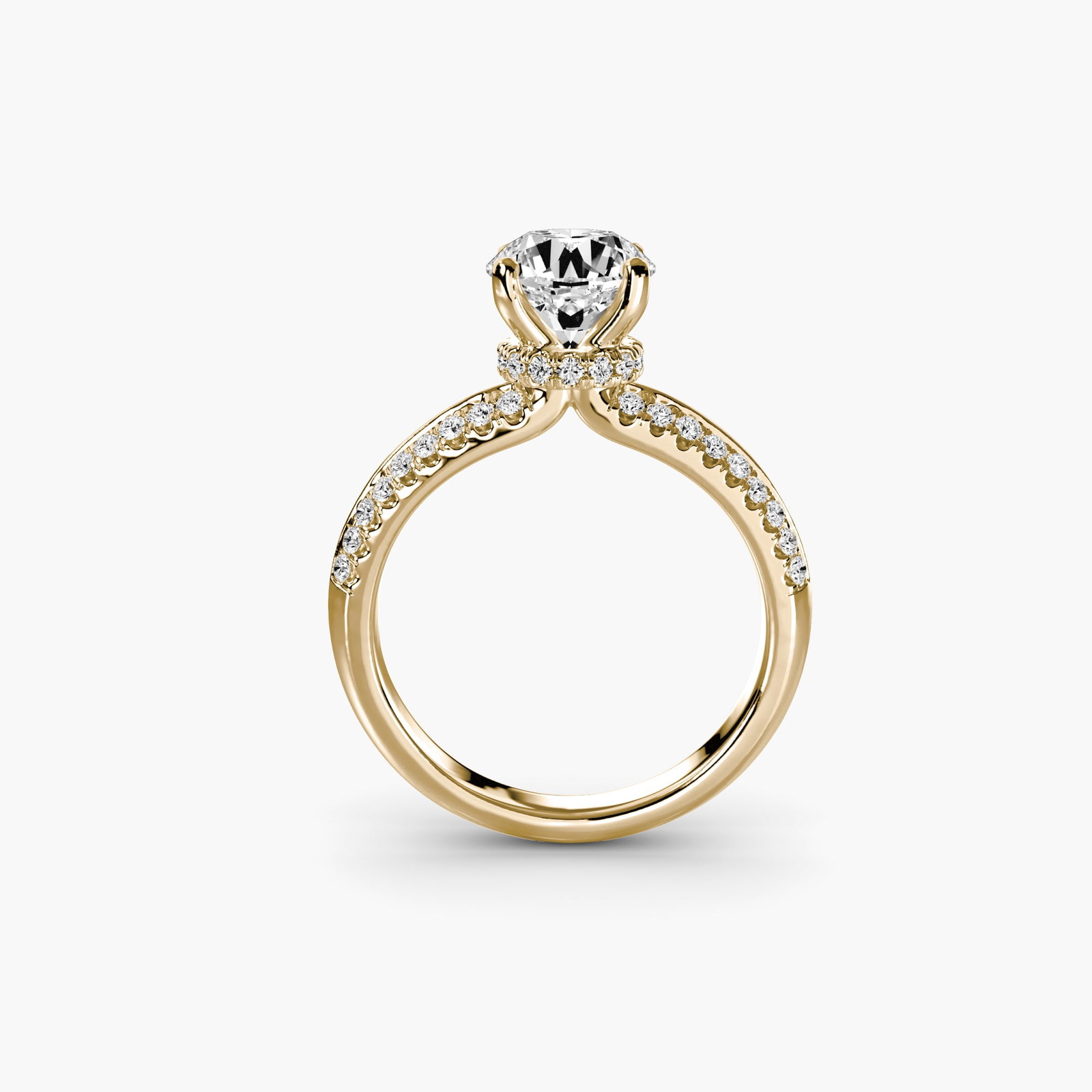Hidden Halo Round 14Kt Yellow Gold Ring Setting: Hidden Halo Round 14Kt Yellow Gold Ring Setting Three round side stones are set in a sleek, 14Kt yellow gold ring setting. The Hidden Halo design adds subtle sparkle to the band, while the EF/VS