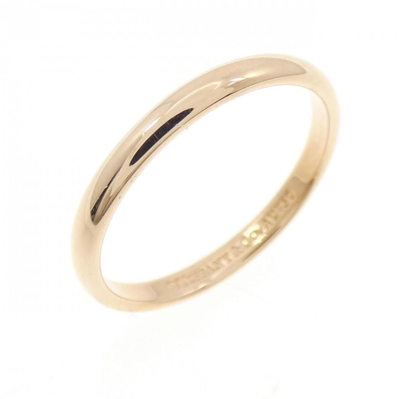 Pink Gold Ring Band Tiffany: Pink Gold Ring Band Tiffany Pink Gold Ring Band Tiffany - A like-new, used band ring in pink gold (18K) with a subtle elegance. This beautiful piece boasts a refined design and premium material,