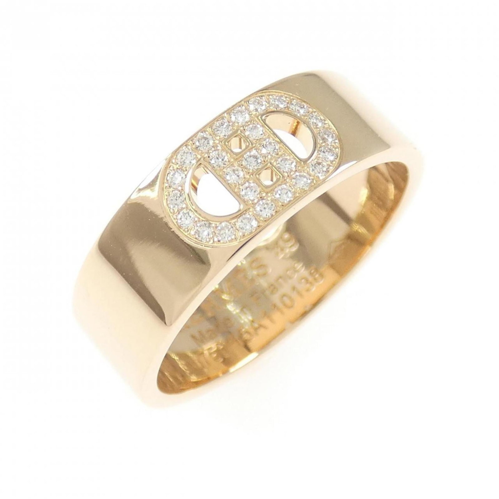 Pink gold band ring by Hermes: Pink gold band ring by Hermes Pink gold band ring by Hermes, featuring a classic design with subtle wear from previous use. The ring bears some minor scratches and dirt, but remains in very good condi