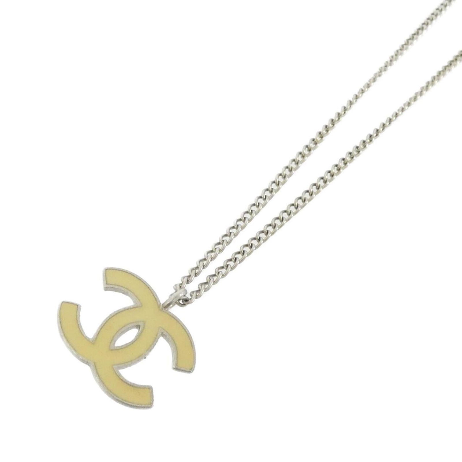 Chanel 24659 Necklace: Chanel 24659 Necklace Chanel's iconic 24659 Necklace boasts a timeless design with a classic silver finish and subtle beige hue. The necklace features a 20mm x 20mm pendant, perfectly complemented by