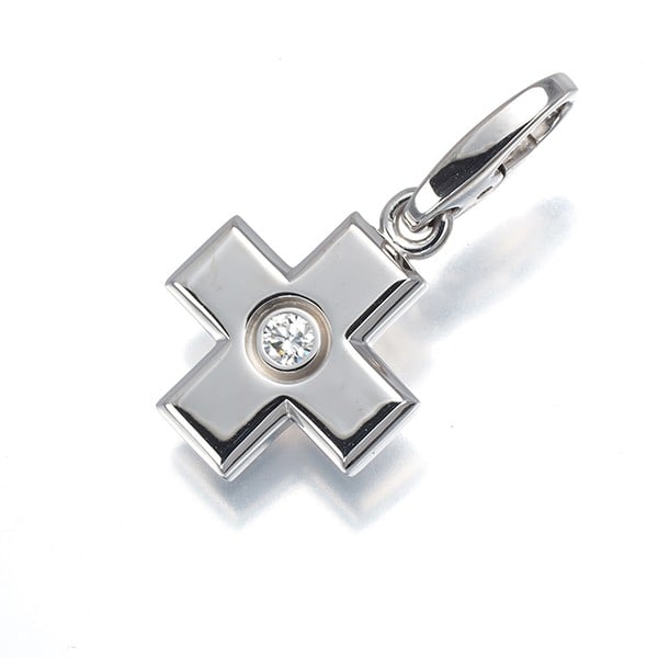 Cartier Pendant Diamond Cross Charm 18K 750 White Gold: Cartier Pendant Diamond Cross Charm 18K 750 White Gold Cartier's iconic pendant diamond cross charm boasts 18k white gold craftsmanship and features a natural diamond as its main stone, set within a s