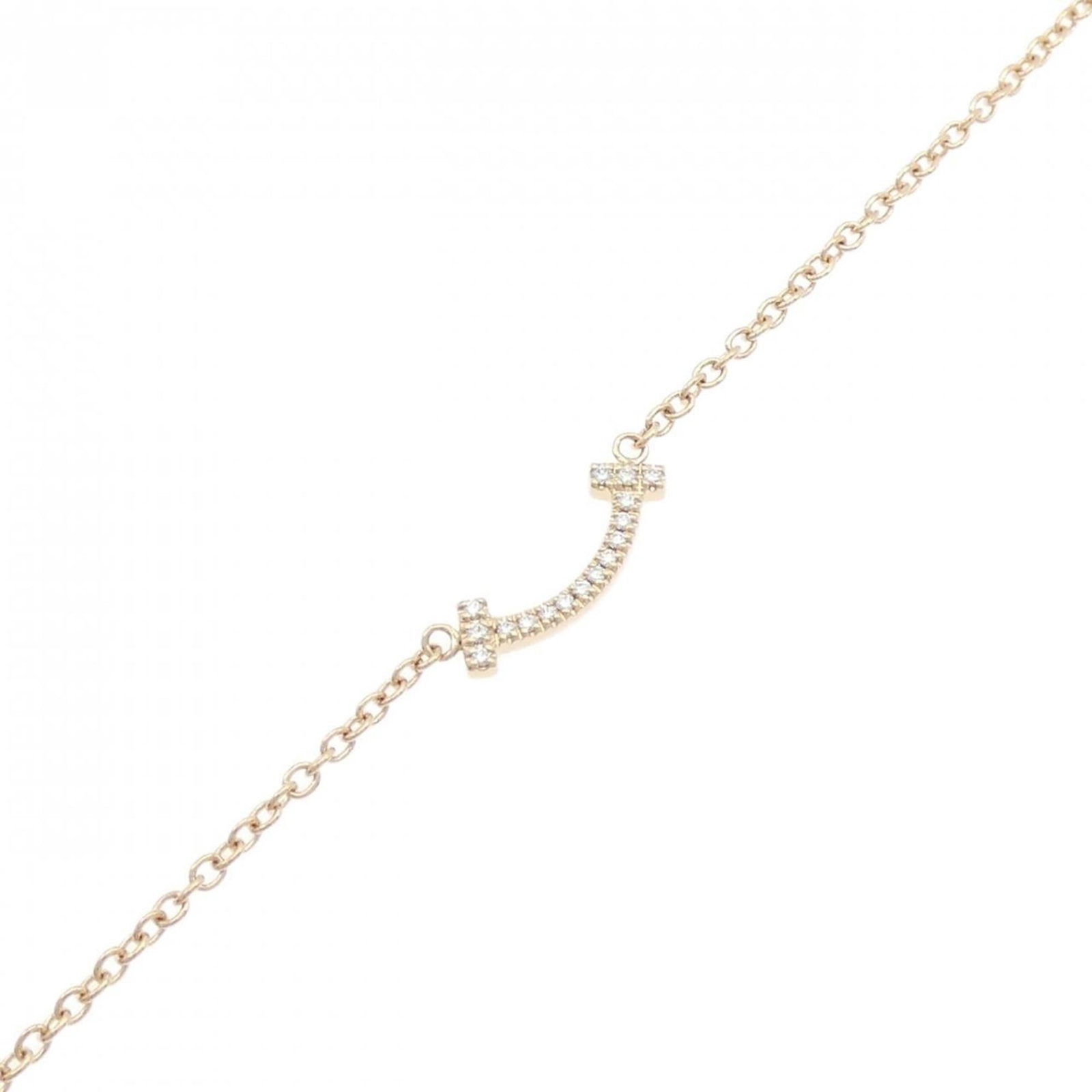 Pink Gold 18K Tiffany Charm Bracelet: Pink Gold 18K Tiffany Charm Bracelet Pink Gold 18K Tiffany Charm Bracelet features a beautiful pink gold (18K) design with diamond accents, making it a stunning accessory for any occasion. The