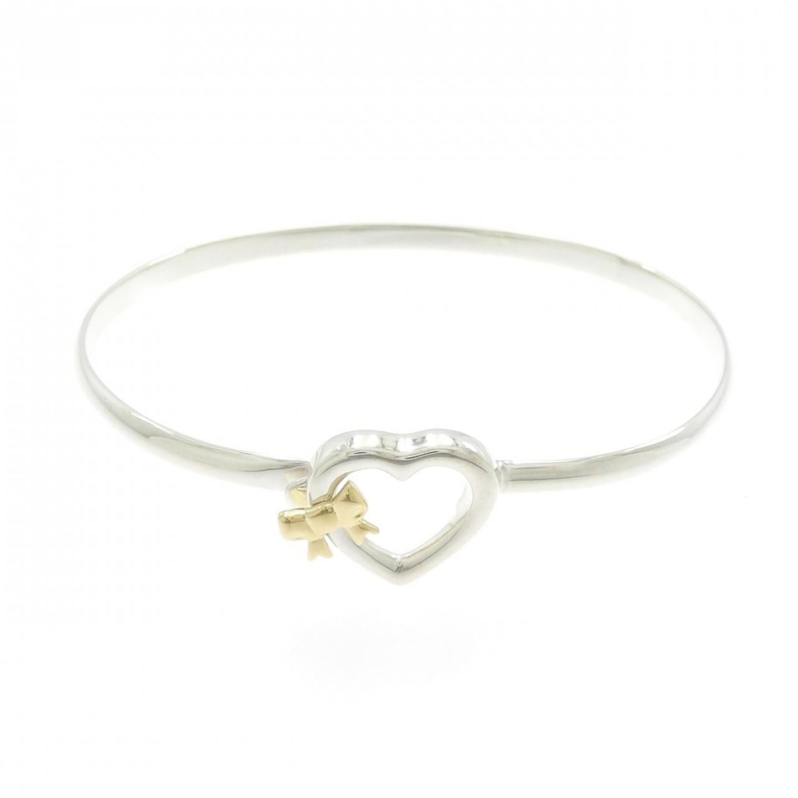 Tiffany Bangle Silver 925 Yellow Gold (18K): Tiffany Bangle Silver 925 Yellow Gold (18K) Tiffany Bangle Silver 925 Yellow Gold (18K) - A stylish and elegant bangle from the renowned luxury brand, featuring a combination of silver 925 and yellow 