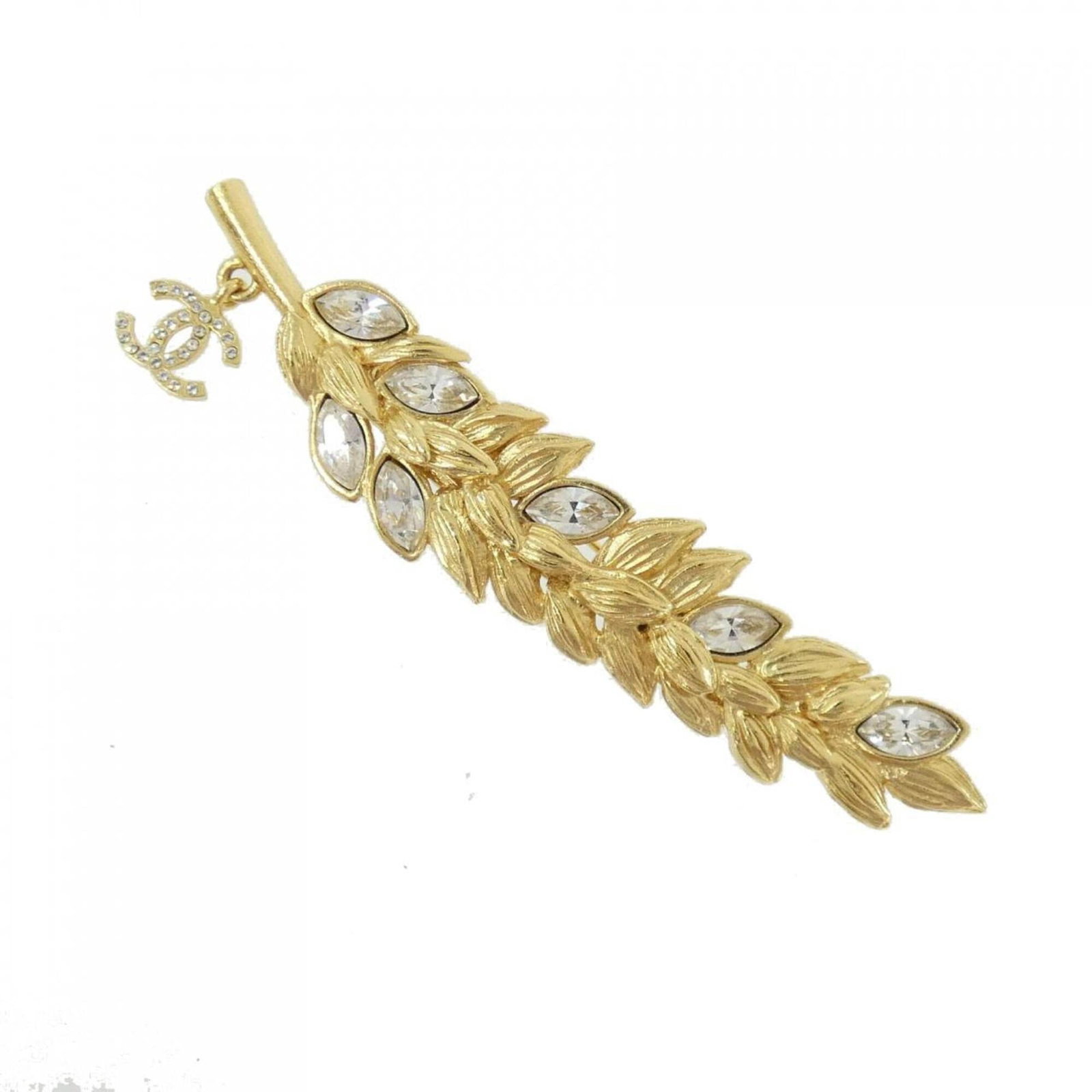 Chanel Brooch: Chanel Brooch Gold crystal brooch from iconic fashion brand Chanel, featuring a subtle sparkle and elegant design. This used piece shows some signs of wear, including minor scratches and dirt, but rem