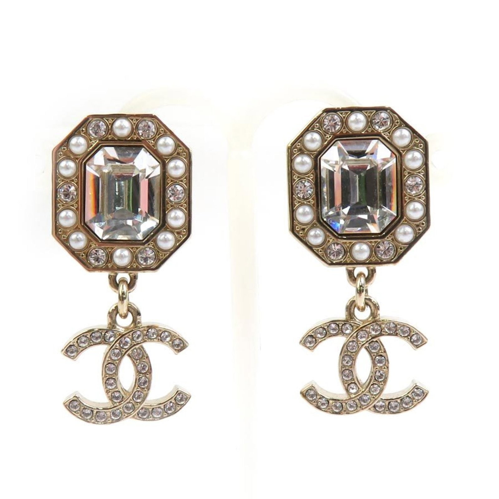 Earrings Metal Stud Chanel Rhinestone: Earrings Metal Stud Chanel Rhinestone Metal stud earrings from Chanel, featuring rhinestones in gold and silver. The earrings have a classic design with a size of 33.00mm x 15.00mm, bearing traces of 